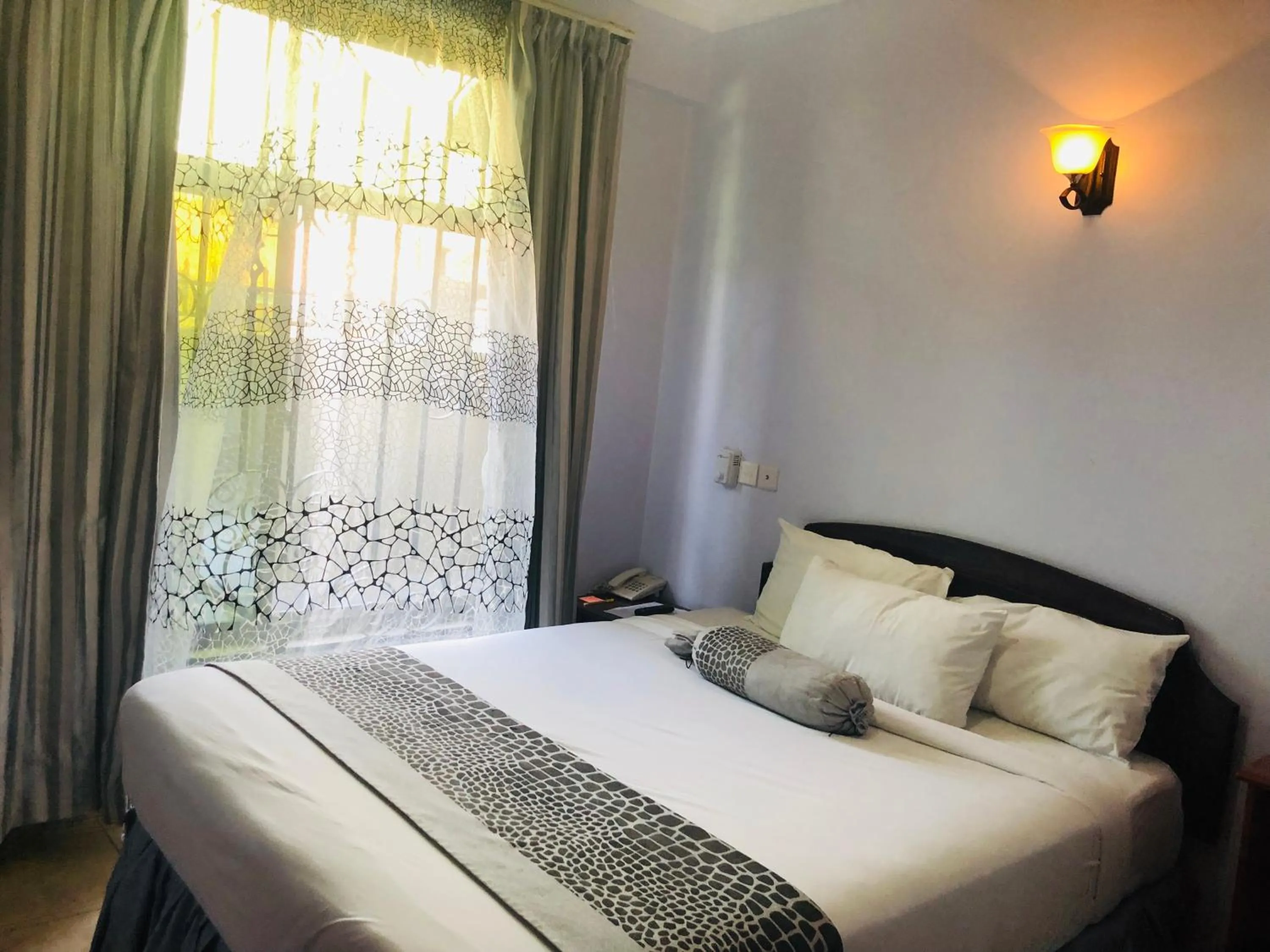 Bed in Green Mountain Hotel