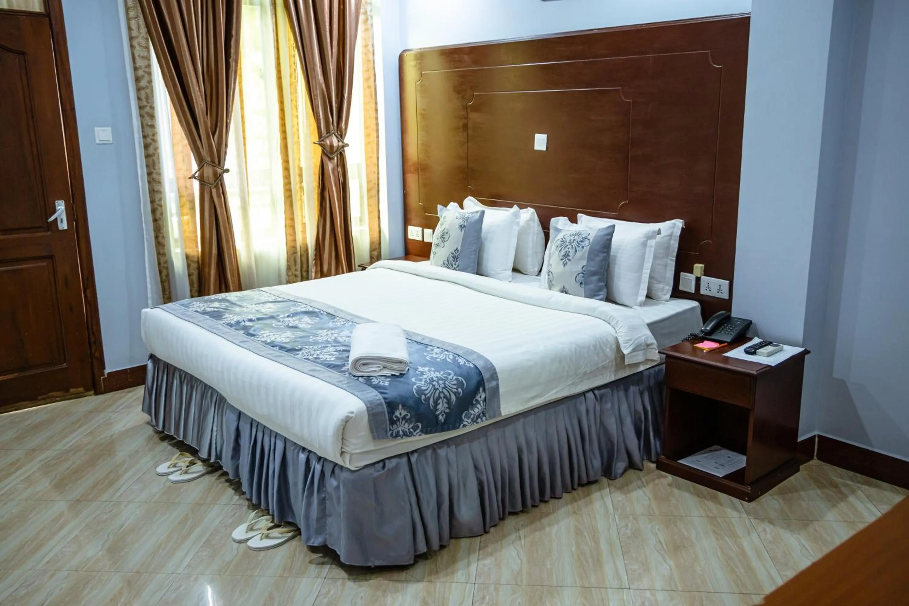 Bed in Green Mountain Hotel