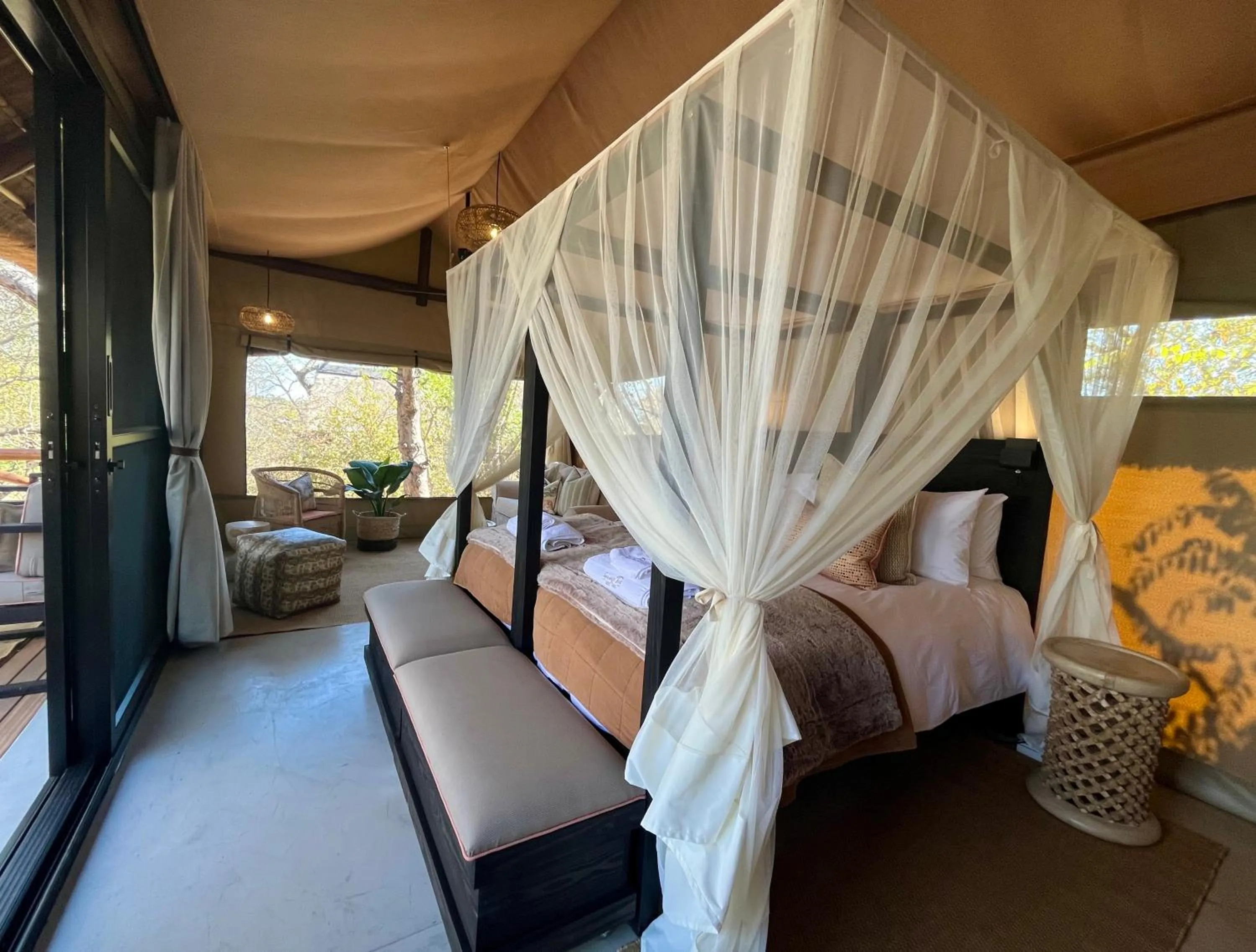 Property building, Bed in Sausage Tree Safari Camp