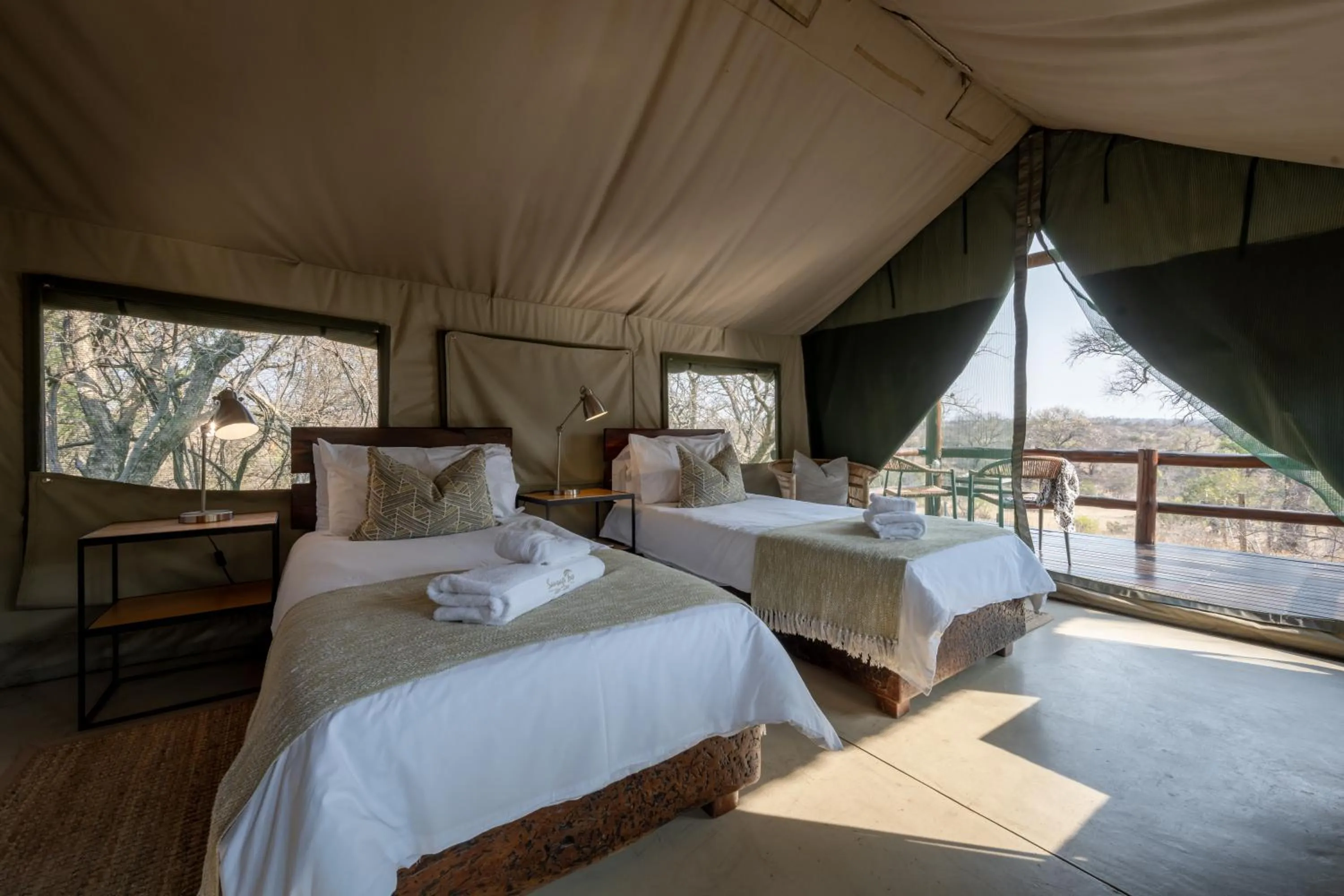 Bed in Sausage Tree Safari Camp