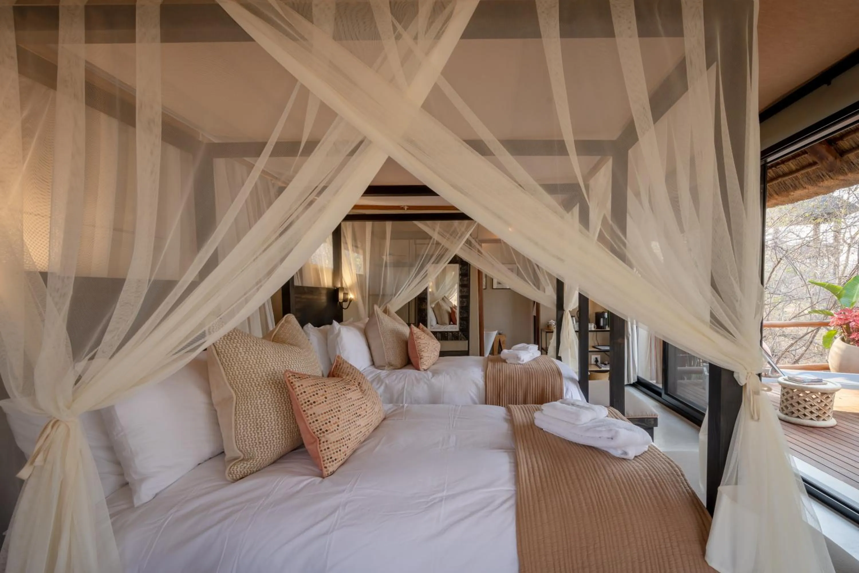 Bed in Sausage Tree Safari Camp