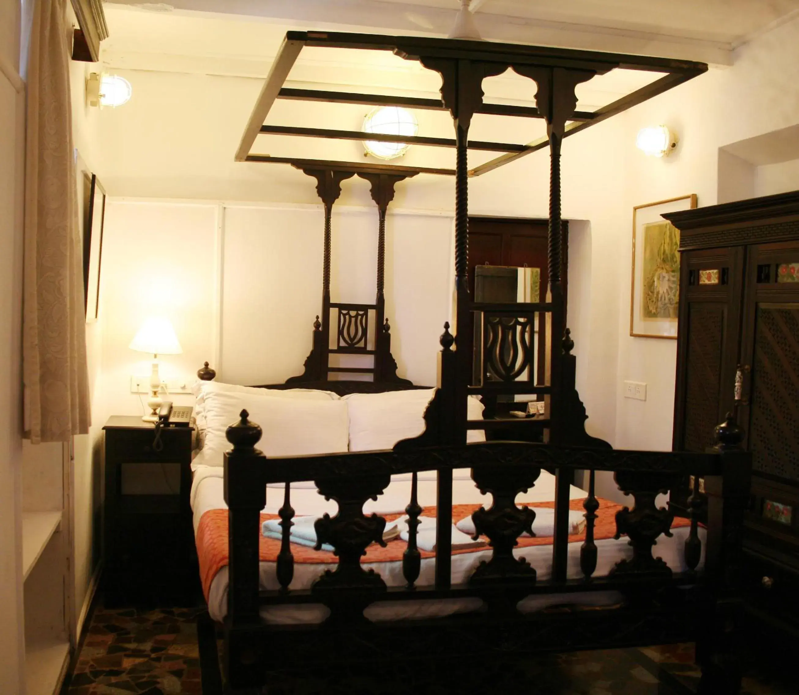 Bed in WelcomHeritage Panjim Pousada Bed in WelcomHeritage Panjim Pousada