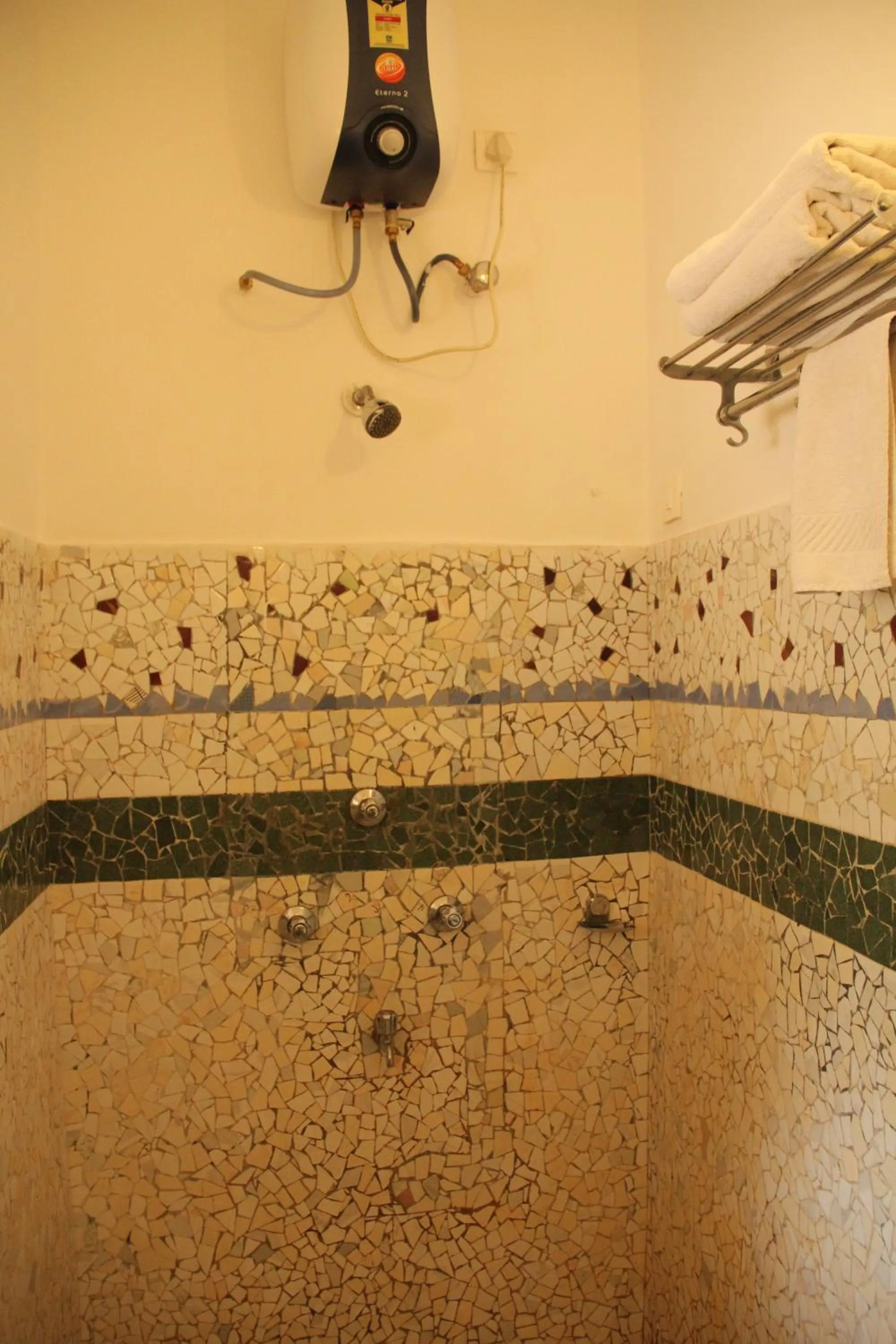 Shower in WelcomHeritage Panjim Pousada