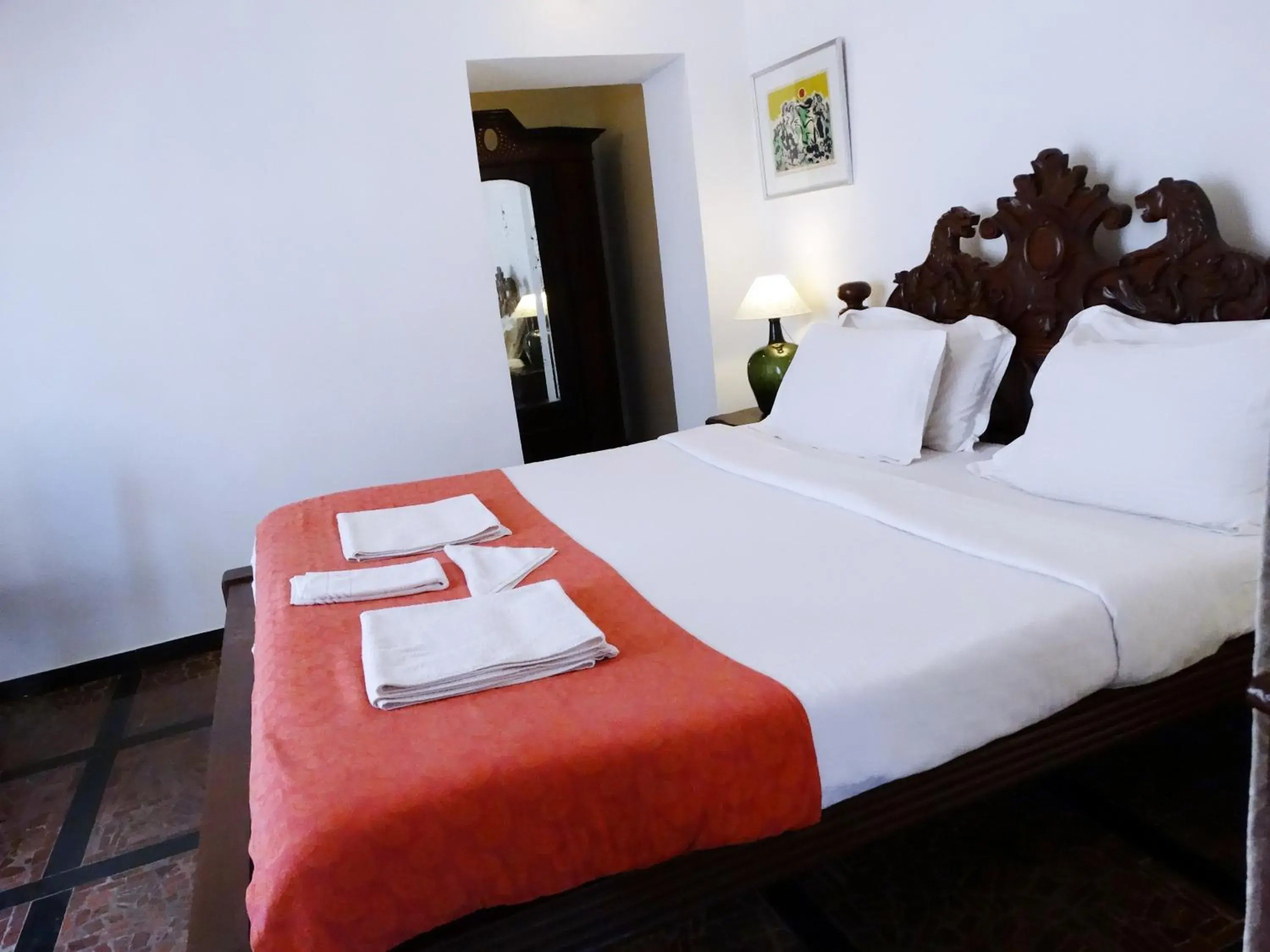 Bed in WelcomHeritage Panjim Pousada Bed in WelcomHeritage Panjim Pousada