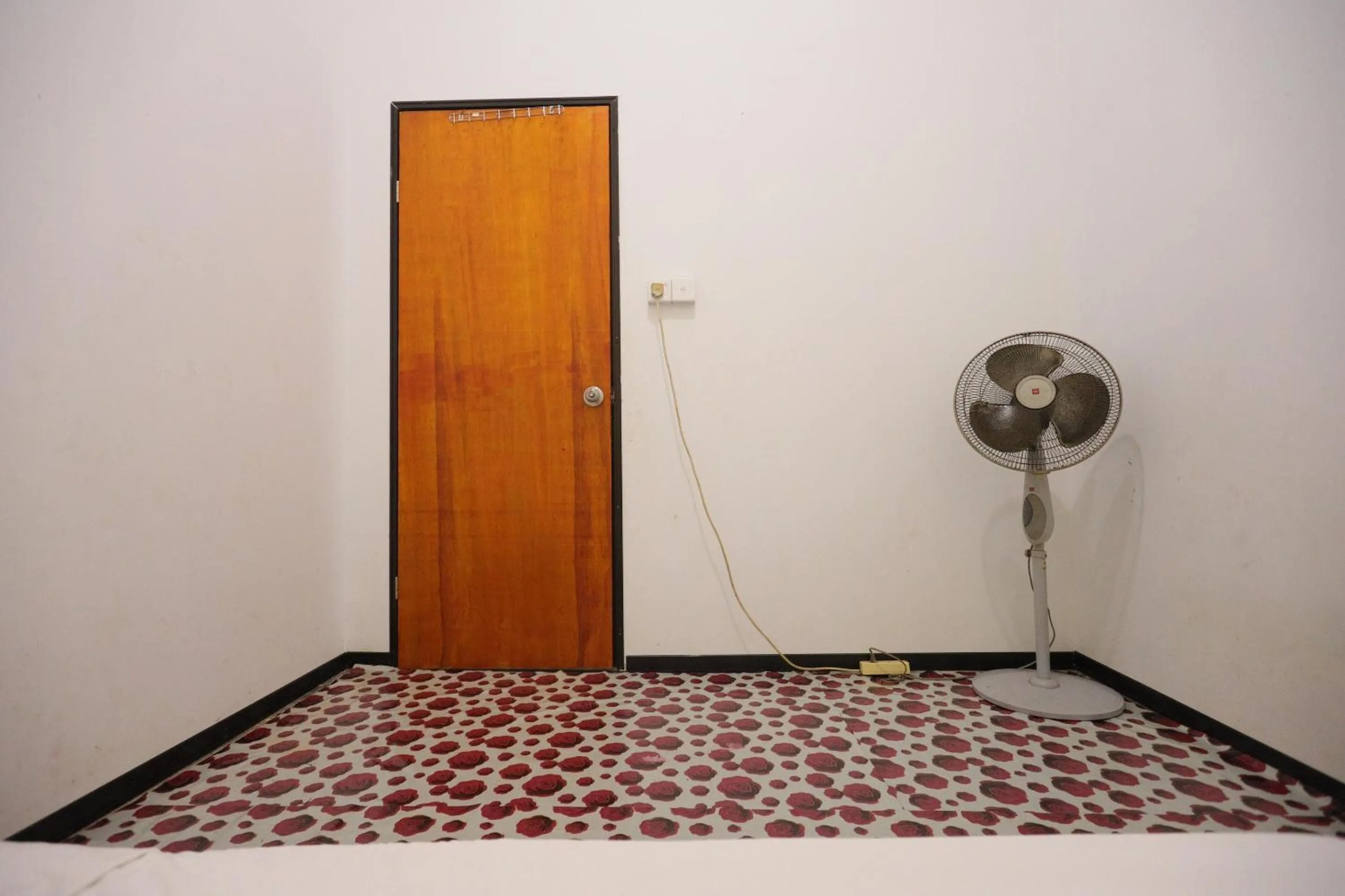 Bedroom in SPOT ON 93446 Penginapan Mak Yes