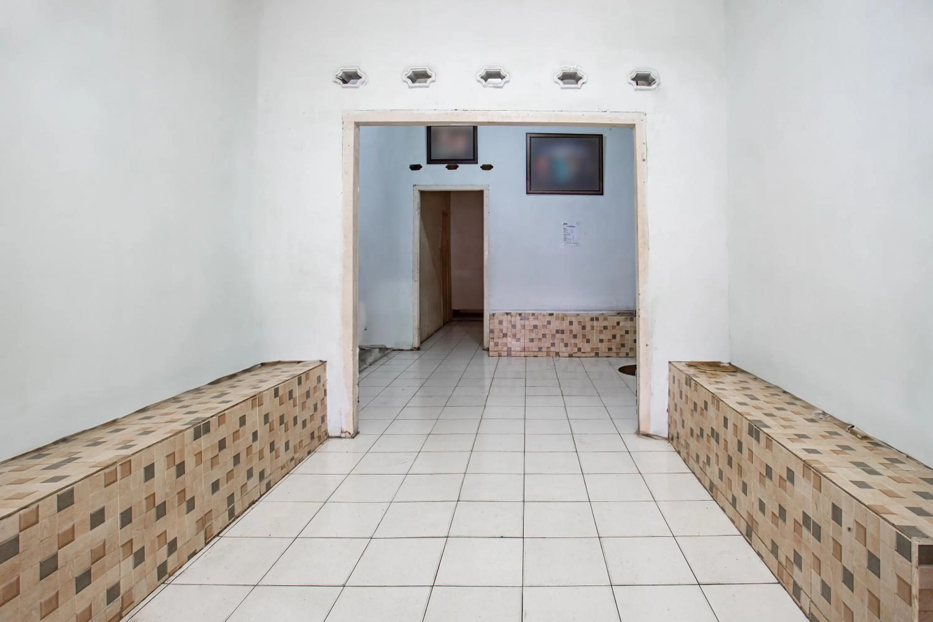 Lobby or reception in Hotel O Penginapan Tulimario Syariah