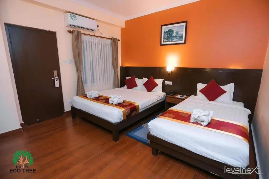 Bed in Hotel Eco Tree Pokhara
