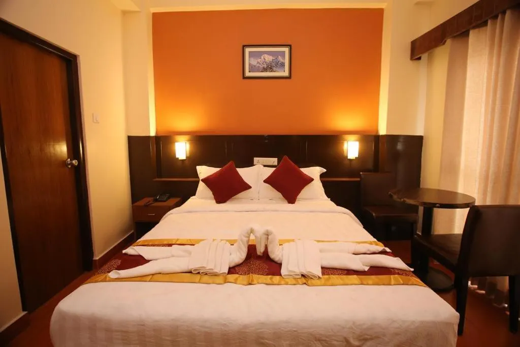 Bed in Hotel Eco Tree Pokhara
