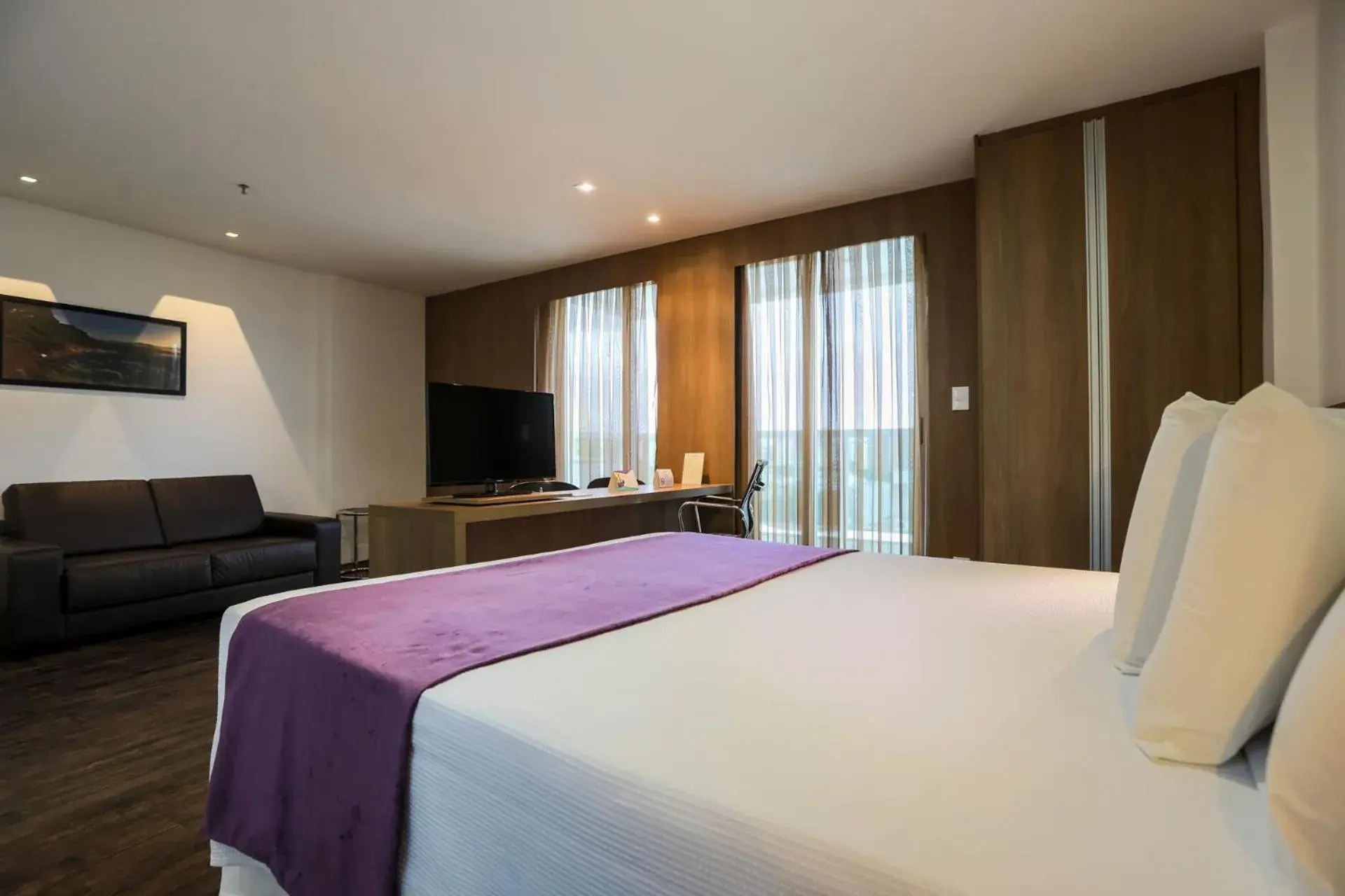 Photo of the whole room, Bed in San Diego Suítes Governador Valadares Photo of the whole room, Bed in San Diego Suítes Governador Valadares