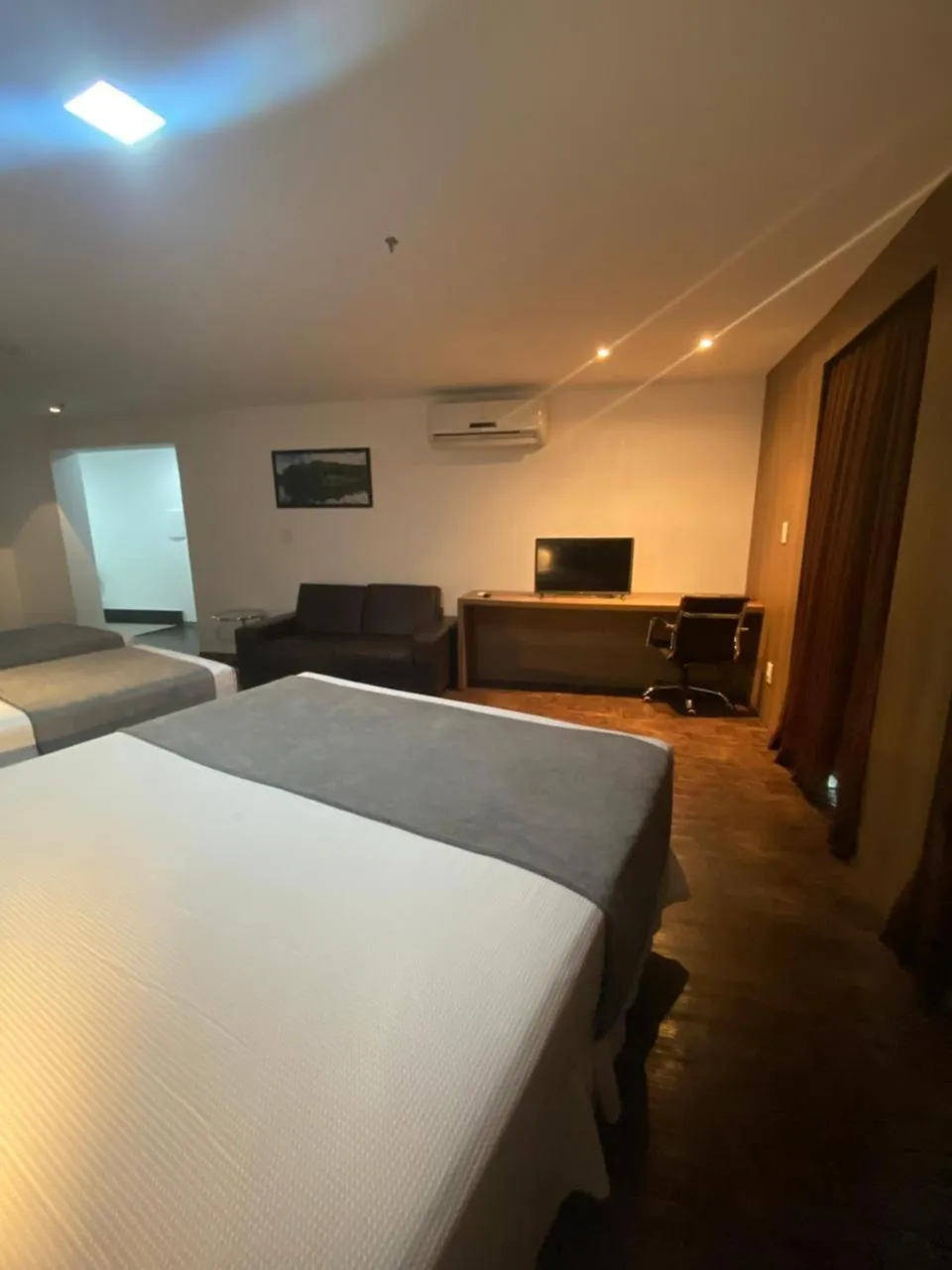 air conditioner, Bed in San Diego Suítes Governador Valadares