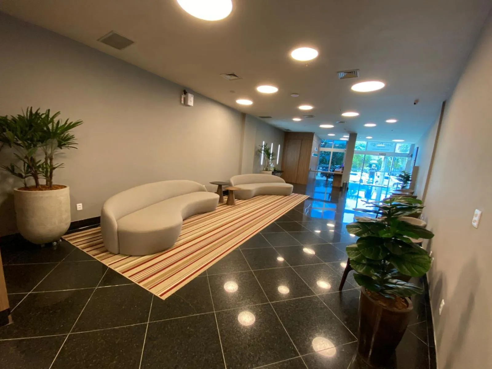 Lobby or reception in San Diego Suítes Governador Valadares