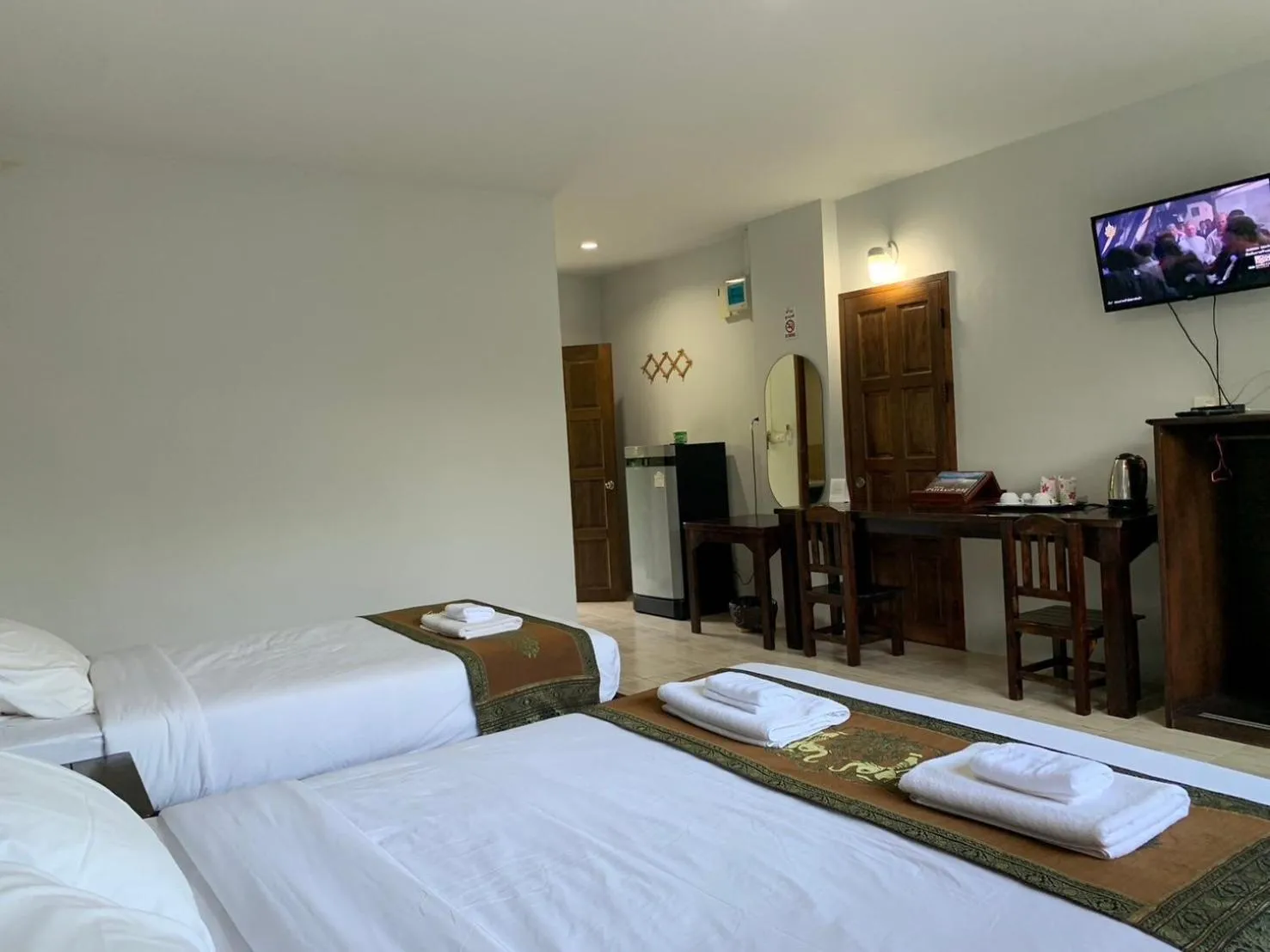 Bed in Saensukkho Hotel & Resort