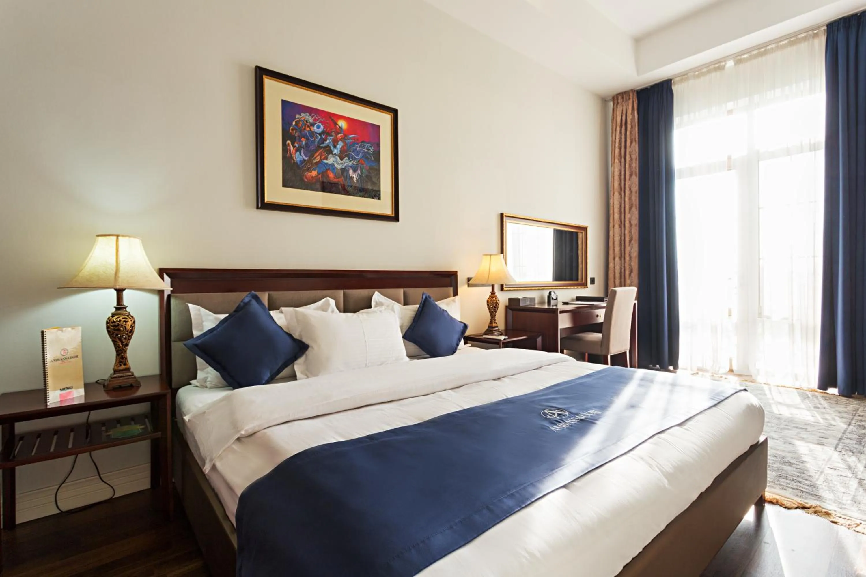 Bed in Ambassador Hotel