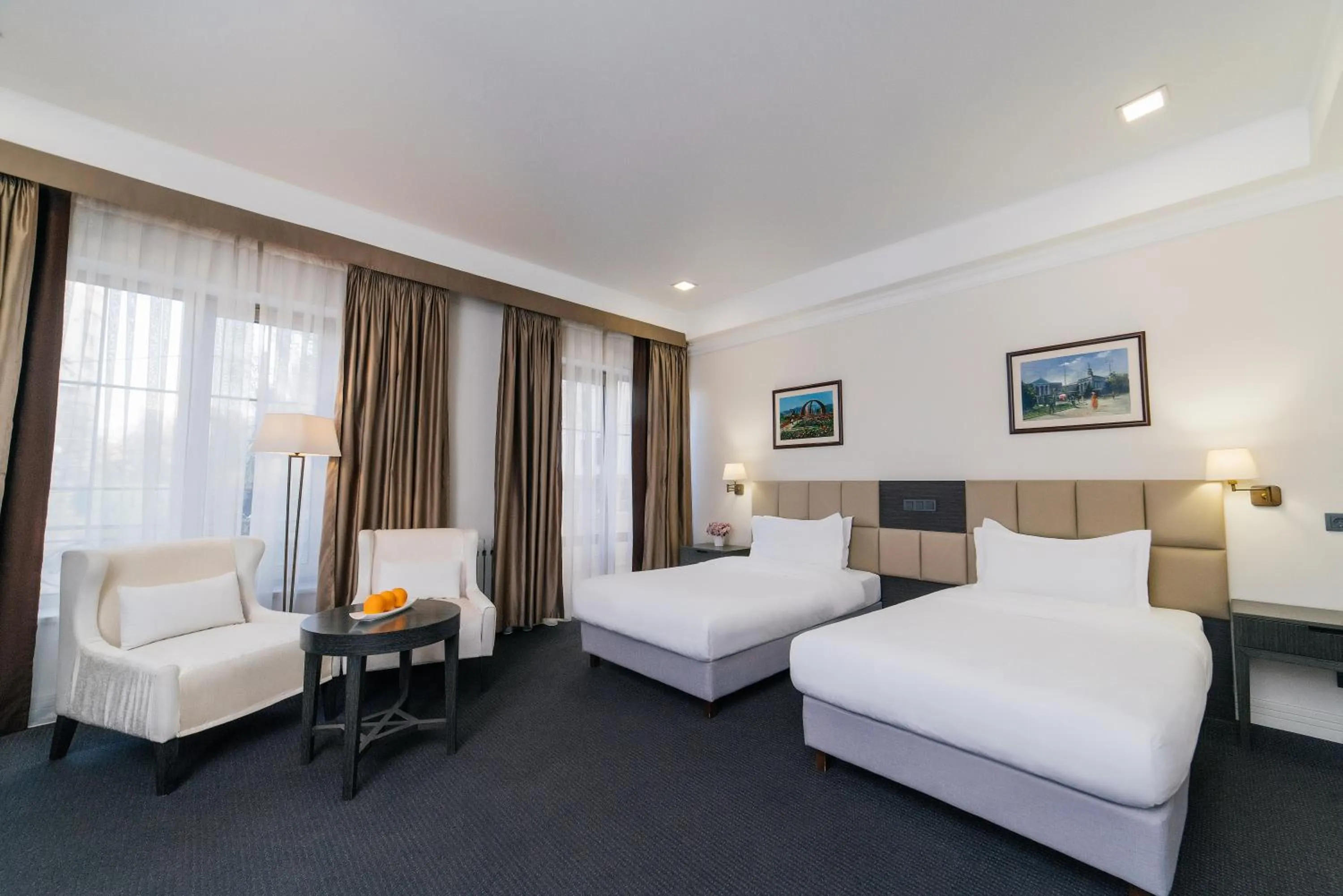 Photo of the whole room, Bed in Ambassador Hotel