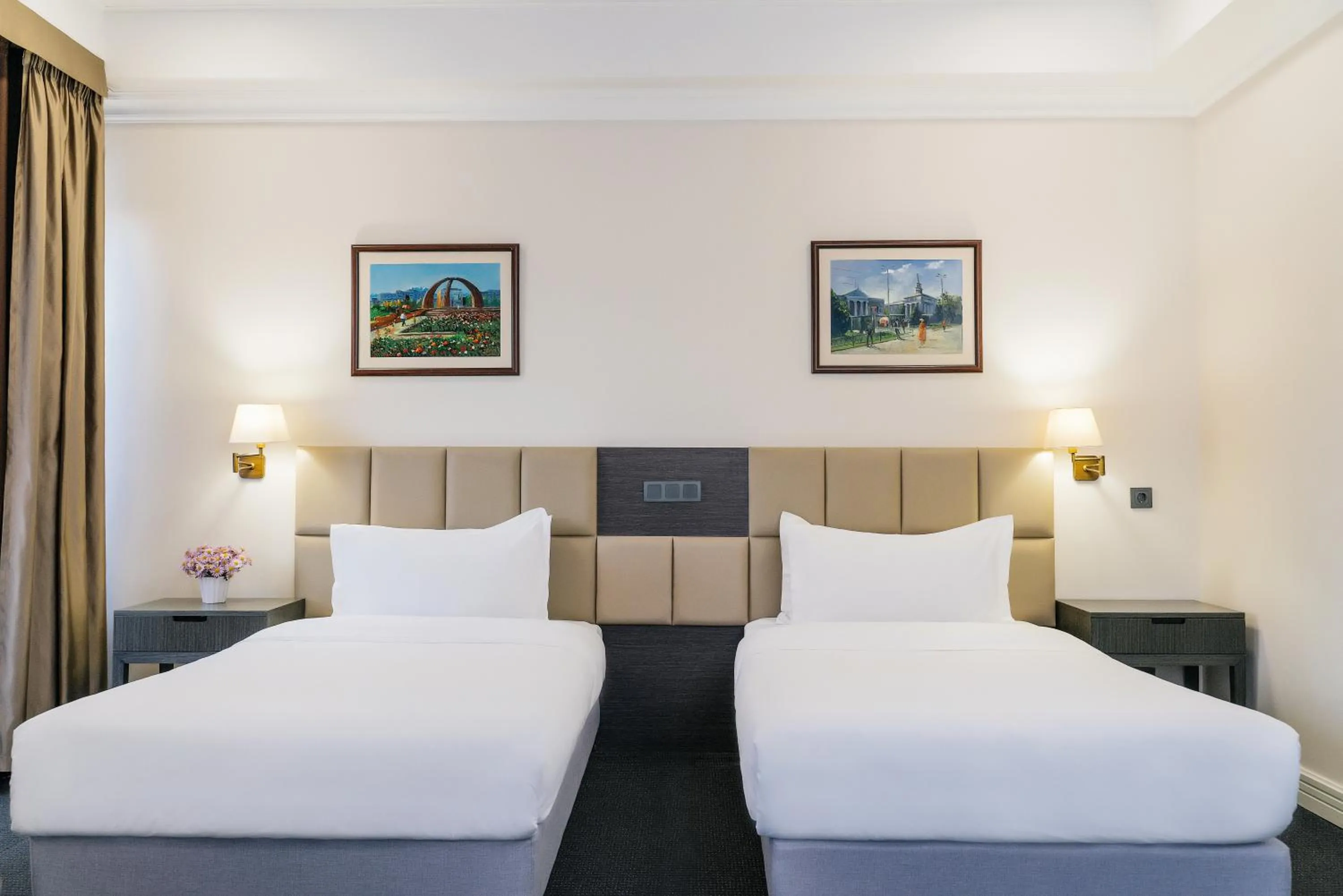 Bed in Ambassador Hotel