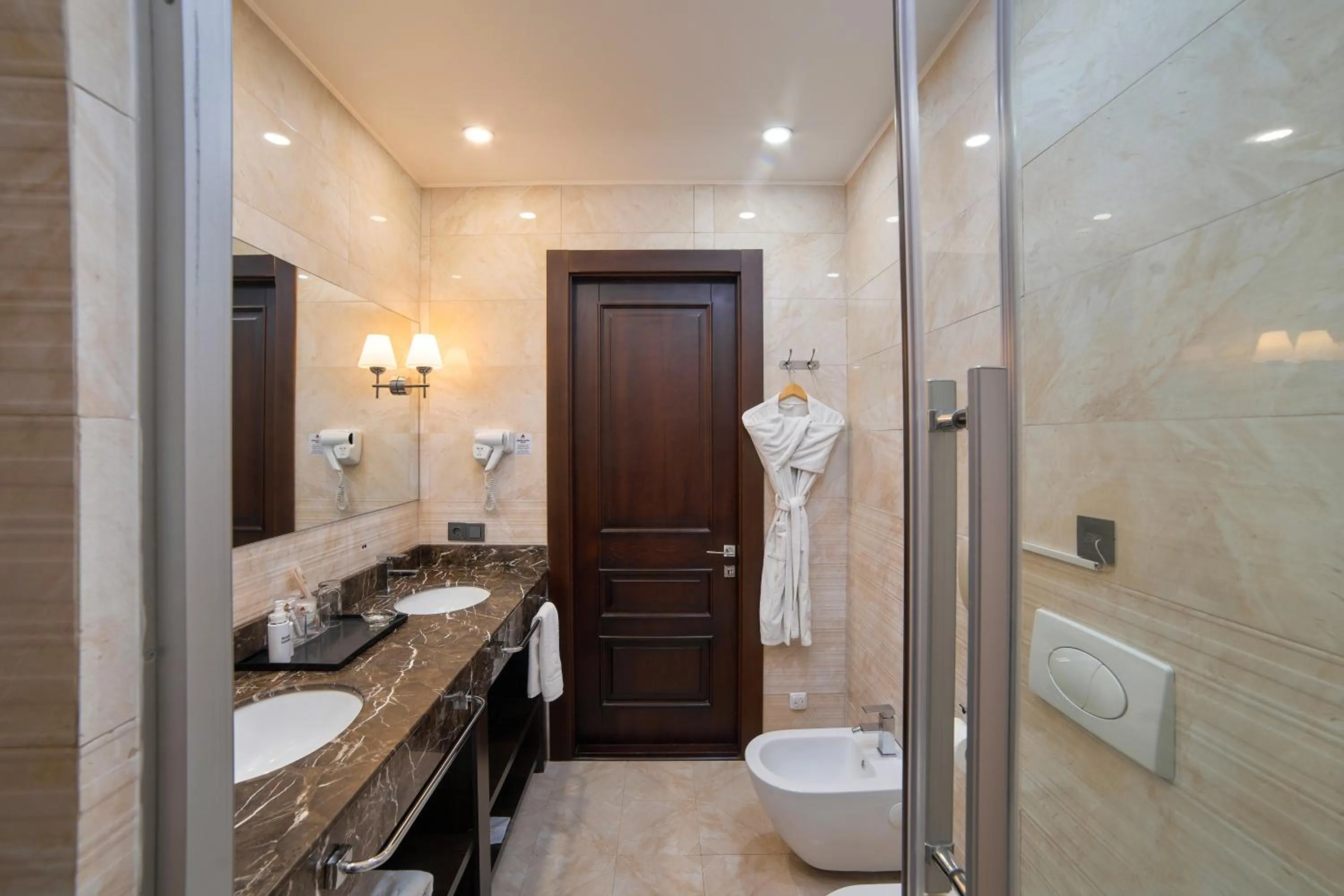 Toilet in Ambassador Hotel