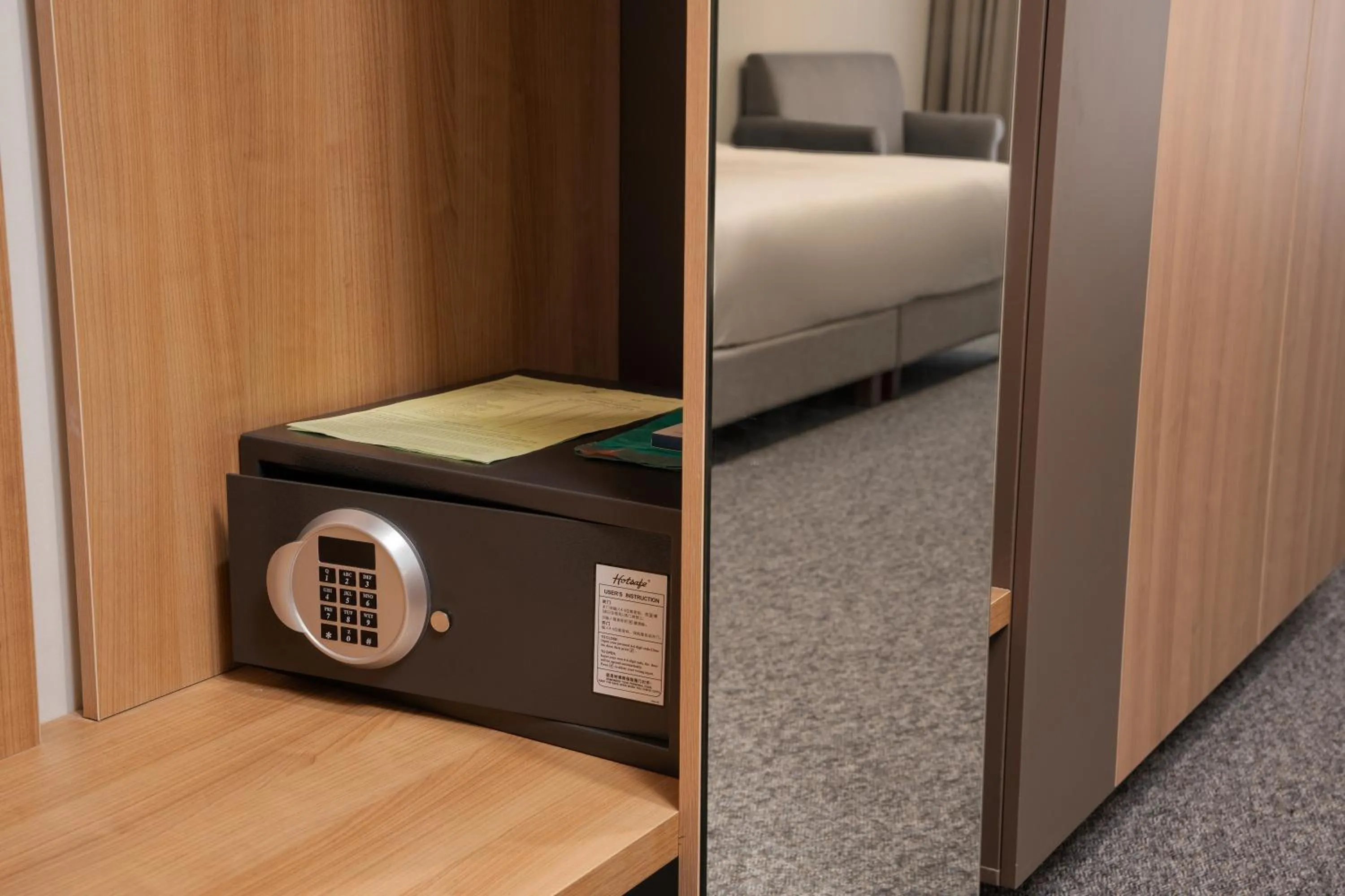 safe, Bed in Ambassador Hotel