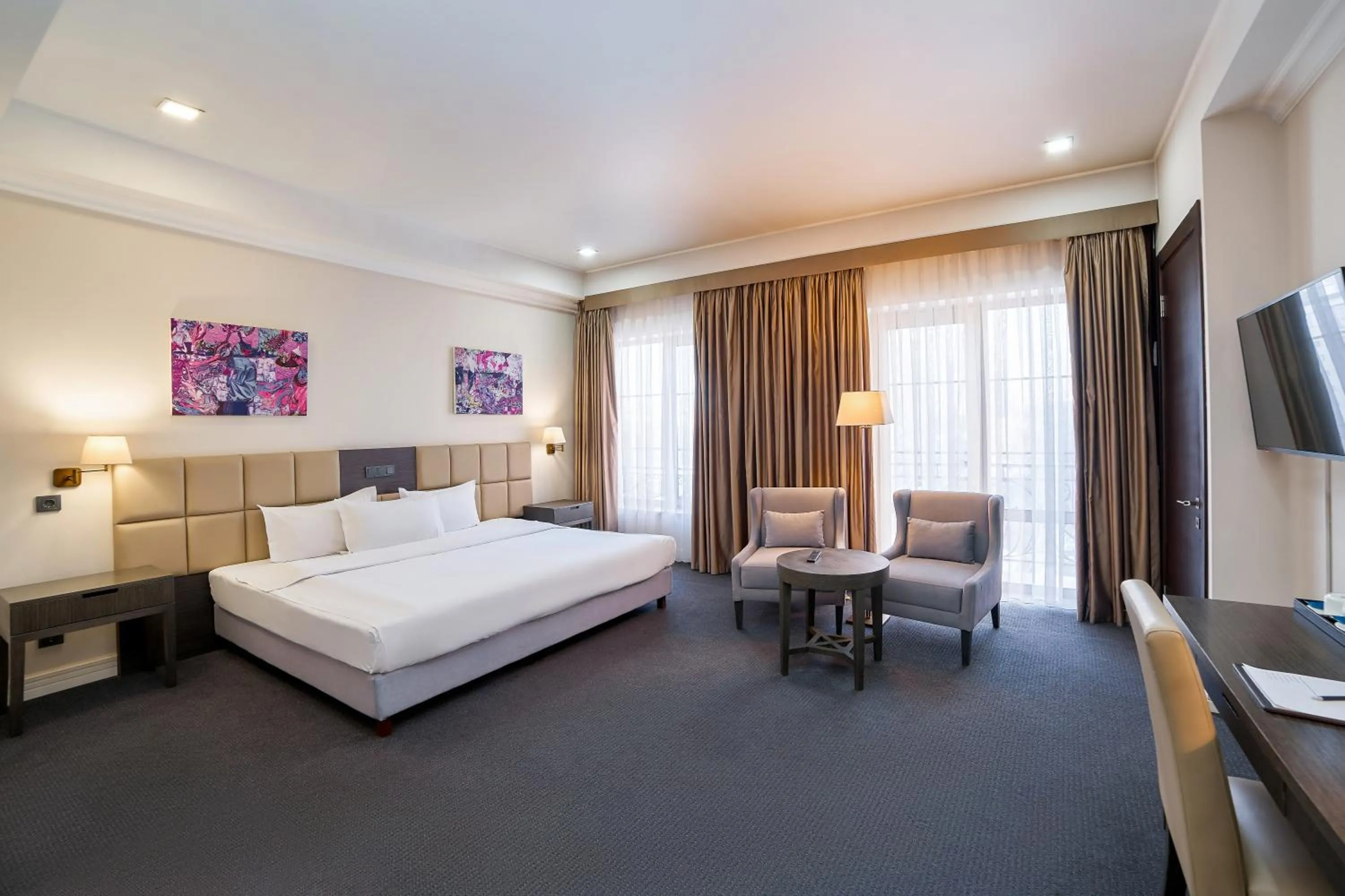 Bed in Ambassador Hotel