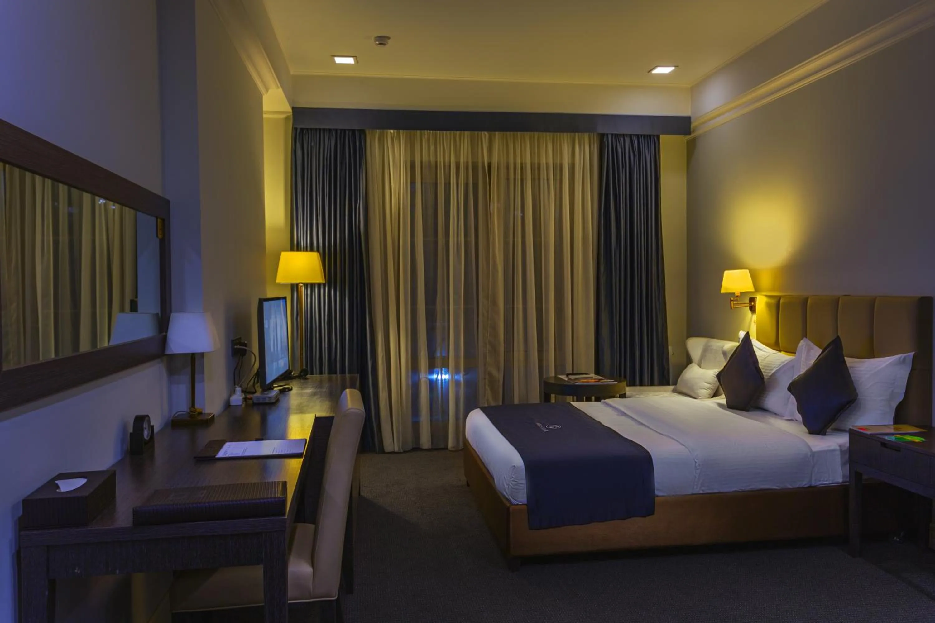 Bedroom, Bed in Ambassador Hotel