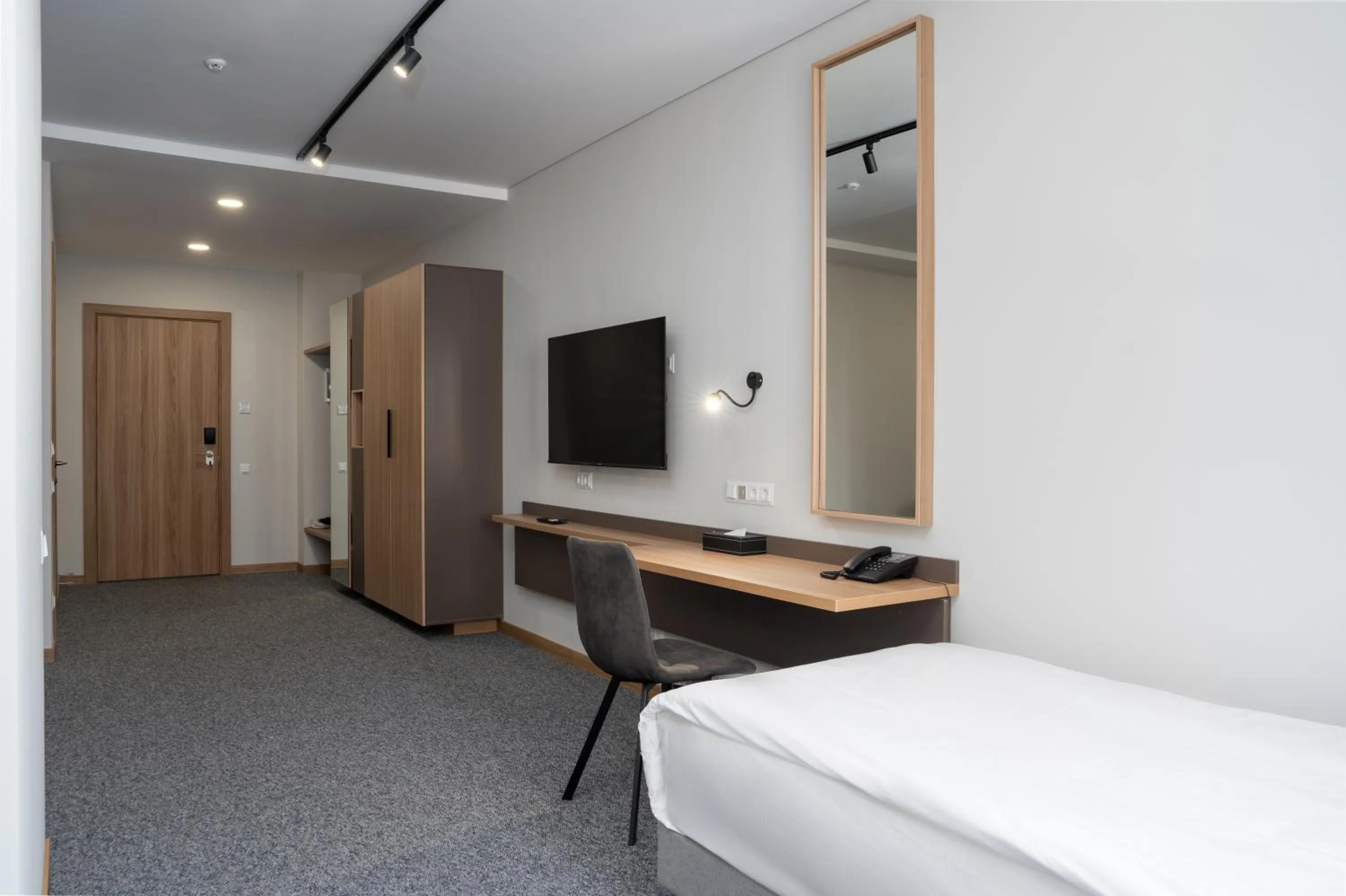 TV and multimedia, Bed in Ambassador Hotel