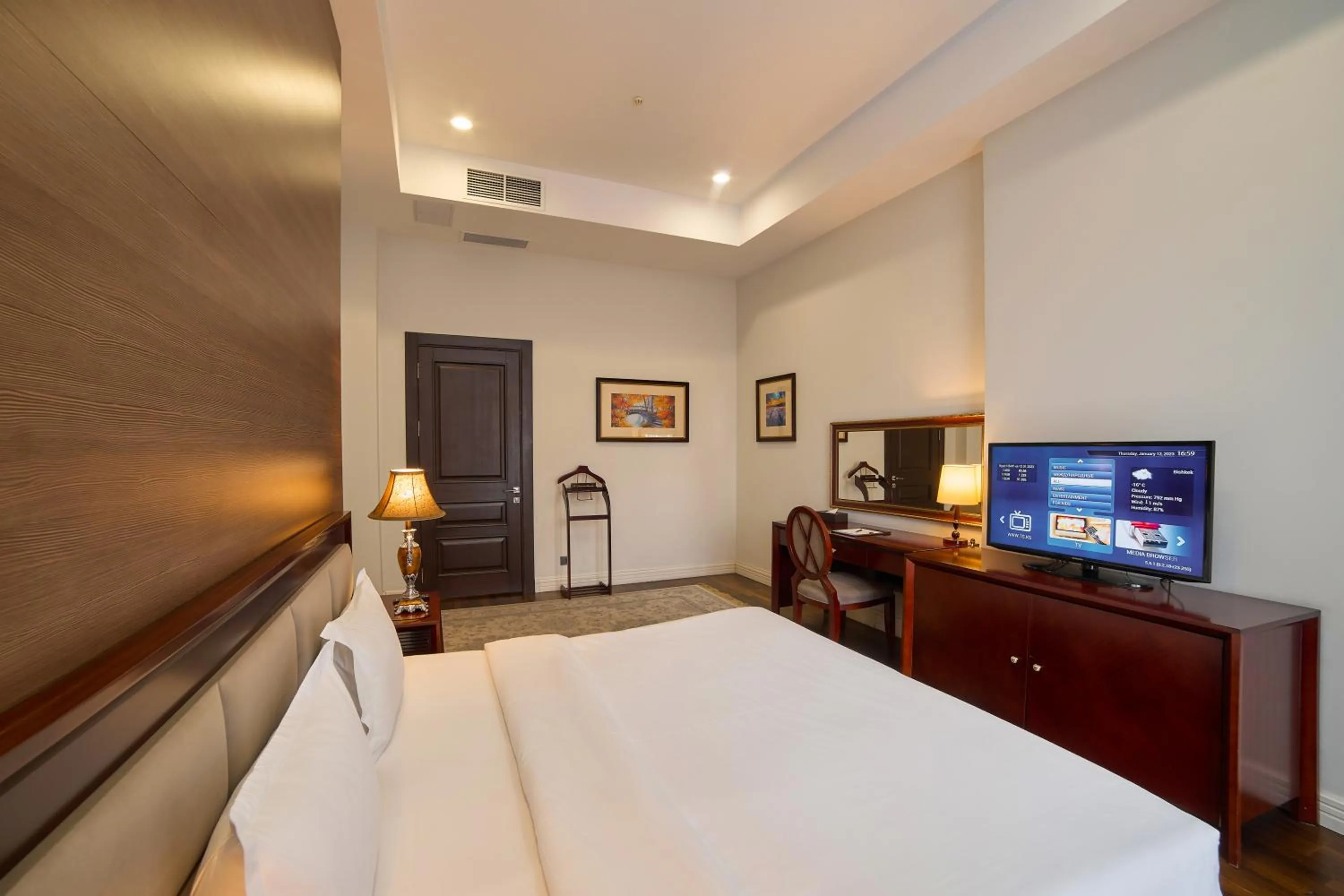 Bed in Ambassador Hotel