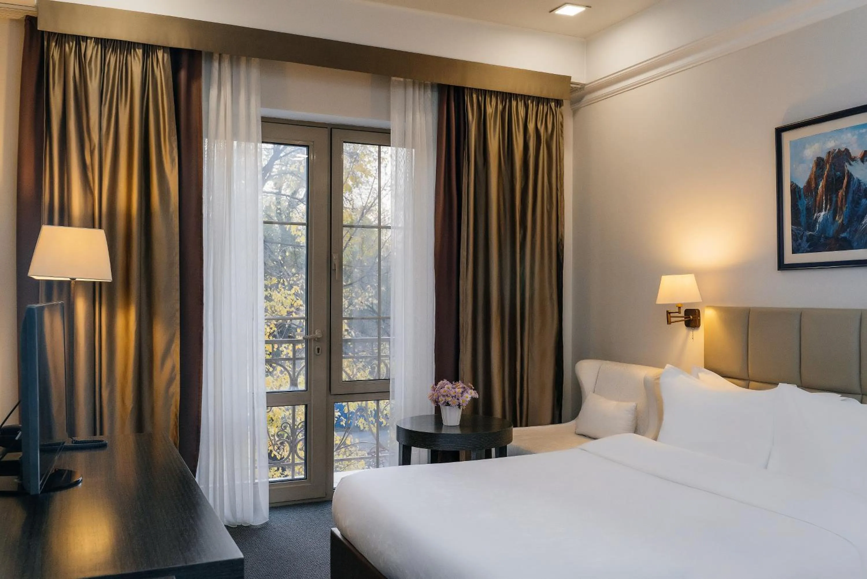 Bed in Ambassador Hotel