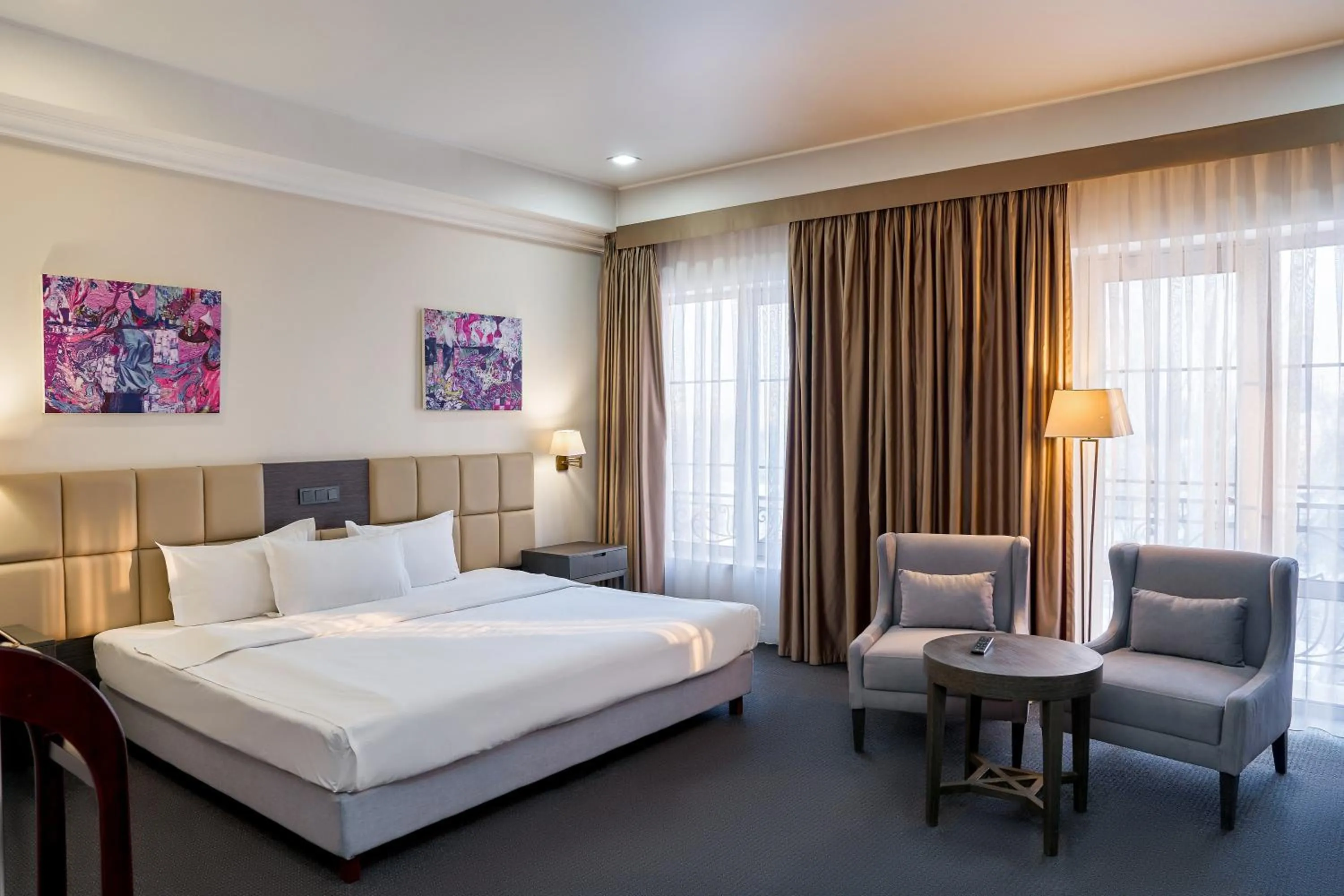 Bed in Ambassador Hotel