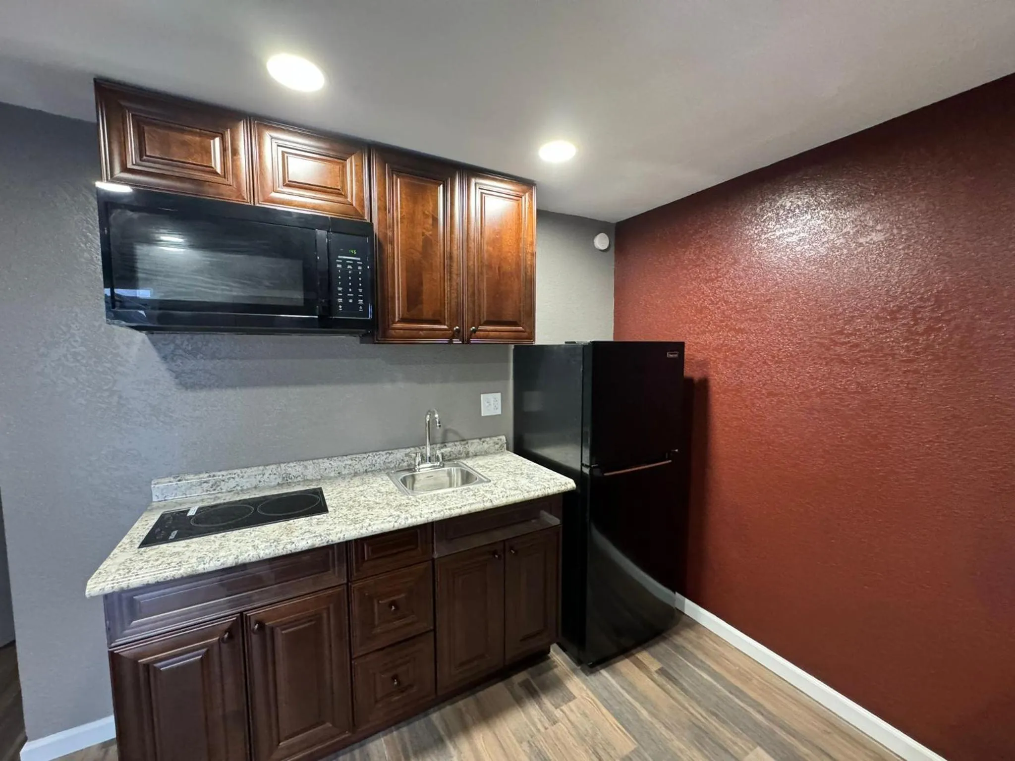 Kitchen or kitchenette in Residency Inn & Studios