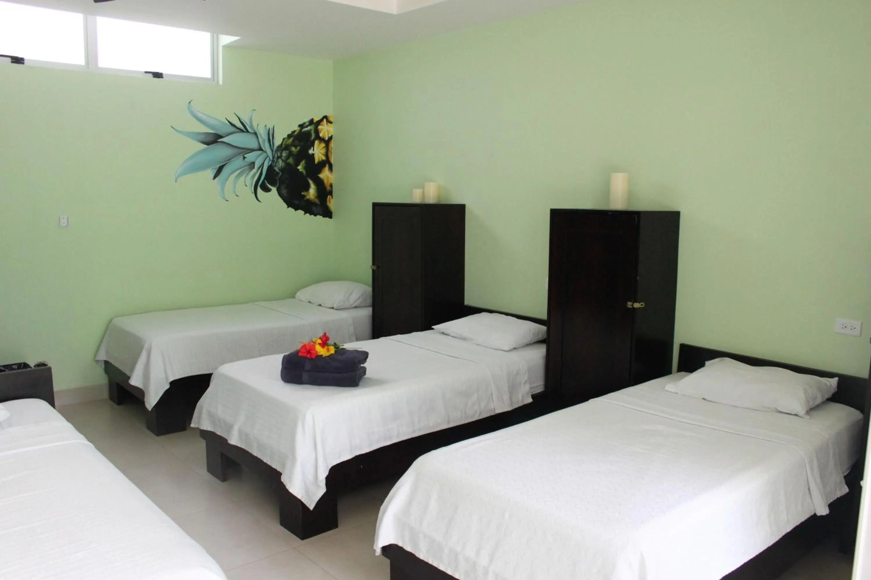 Standard Quadruple Room in Room2Board Hostel and Surf School