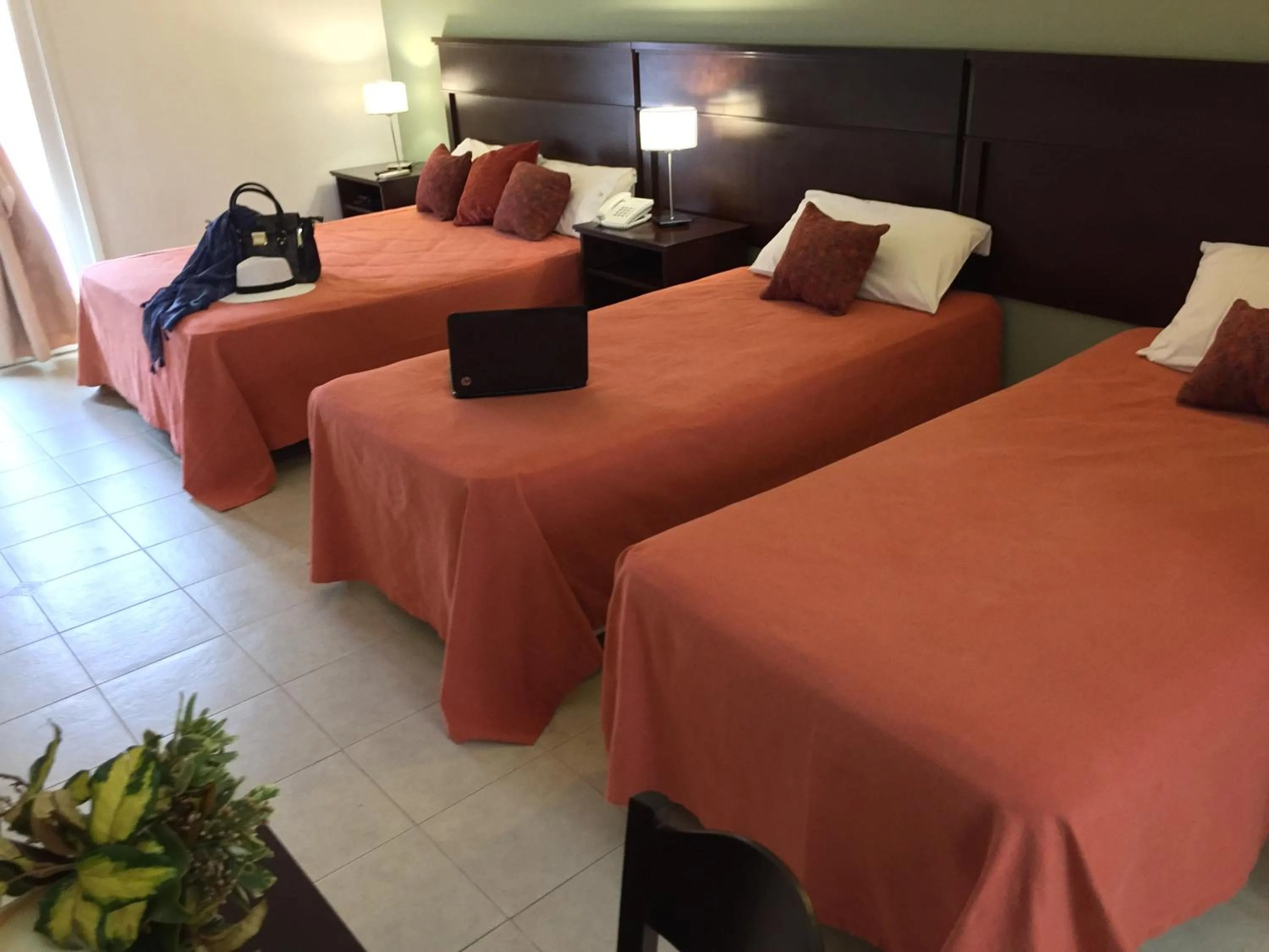 Bed in San Miguel Plaza Hotel All Inclusive