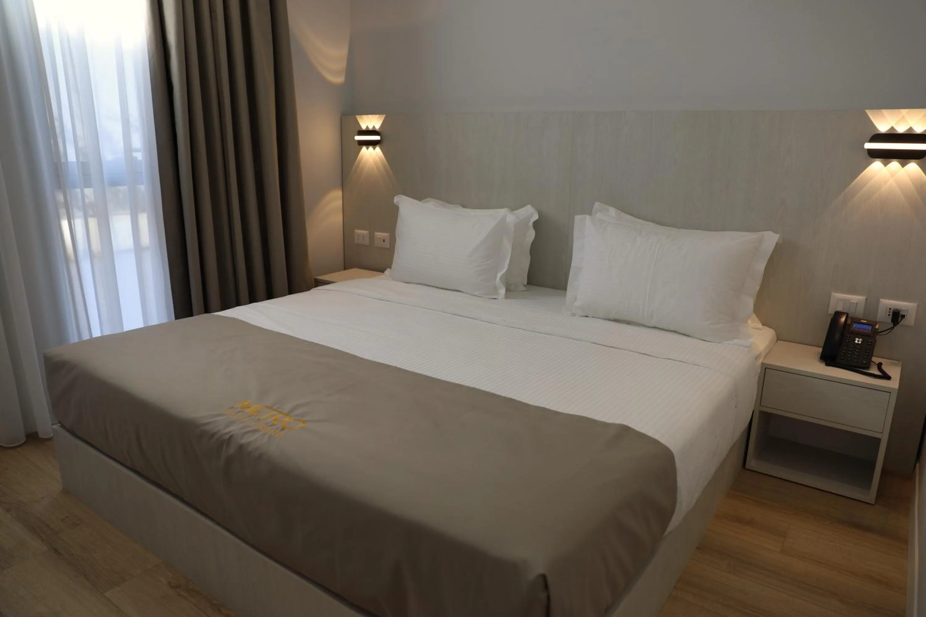 Bed in Metro Hotel Terminal