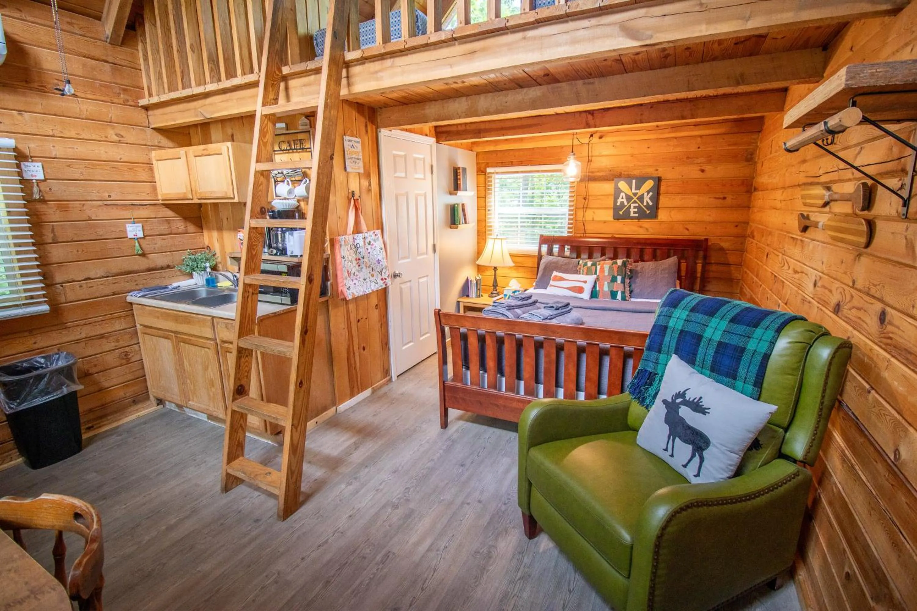 Bed in Kozy Haven Log Cabin Rentals