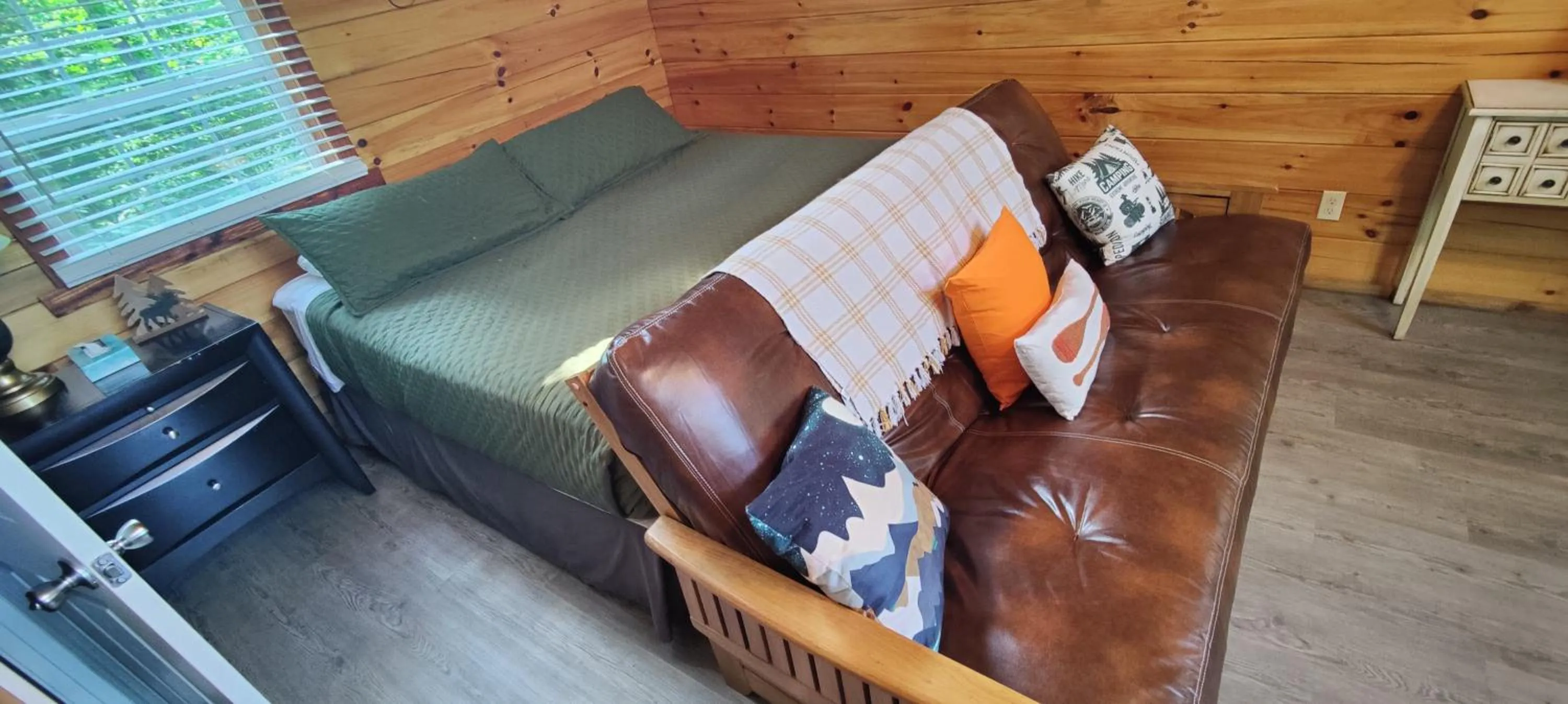 Bed in Kozy Haven Log Cabin Rentals