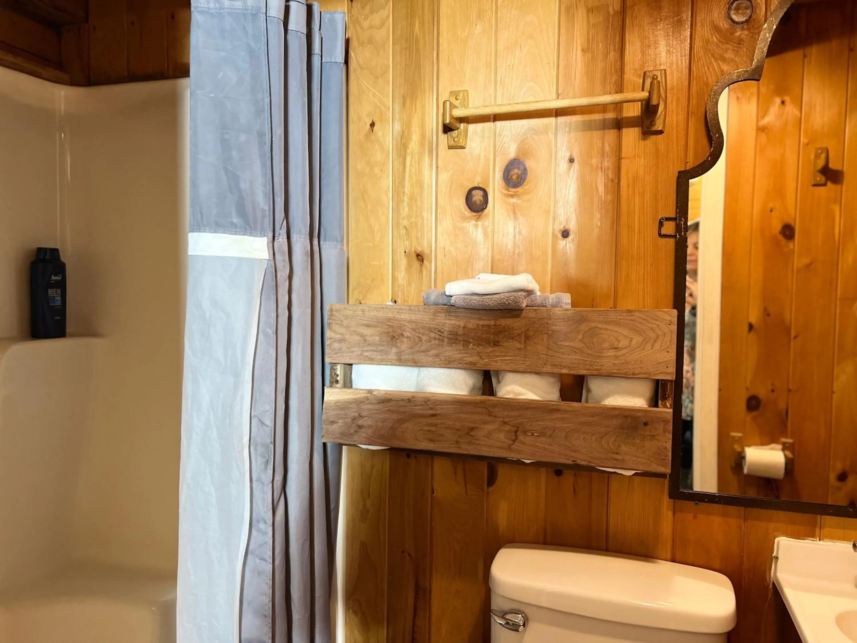 Toilet in Kozy Haven Log Cabin Rentals