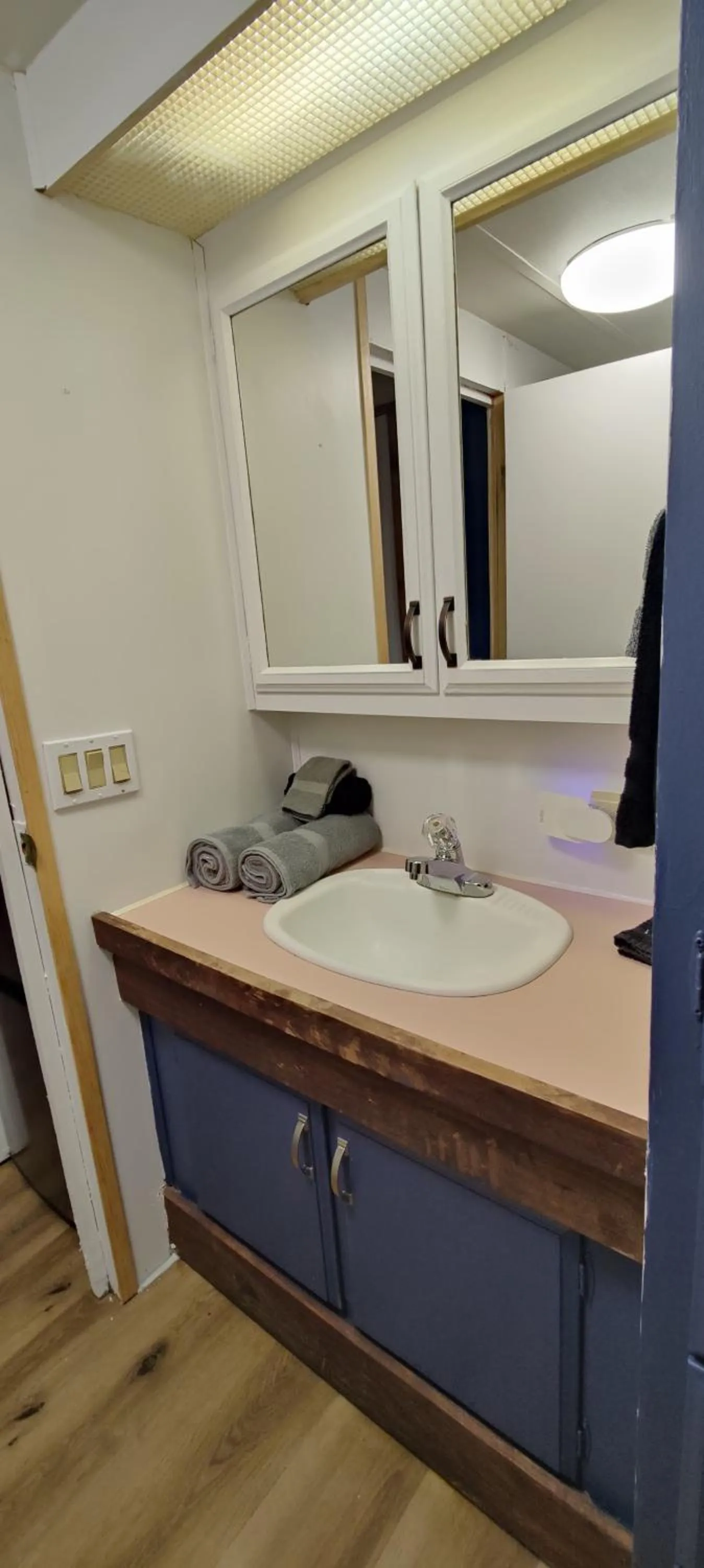 Toilet in Kozy Haven Log Cabin Rentals