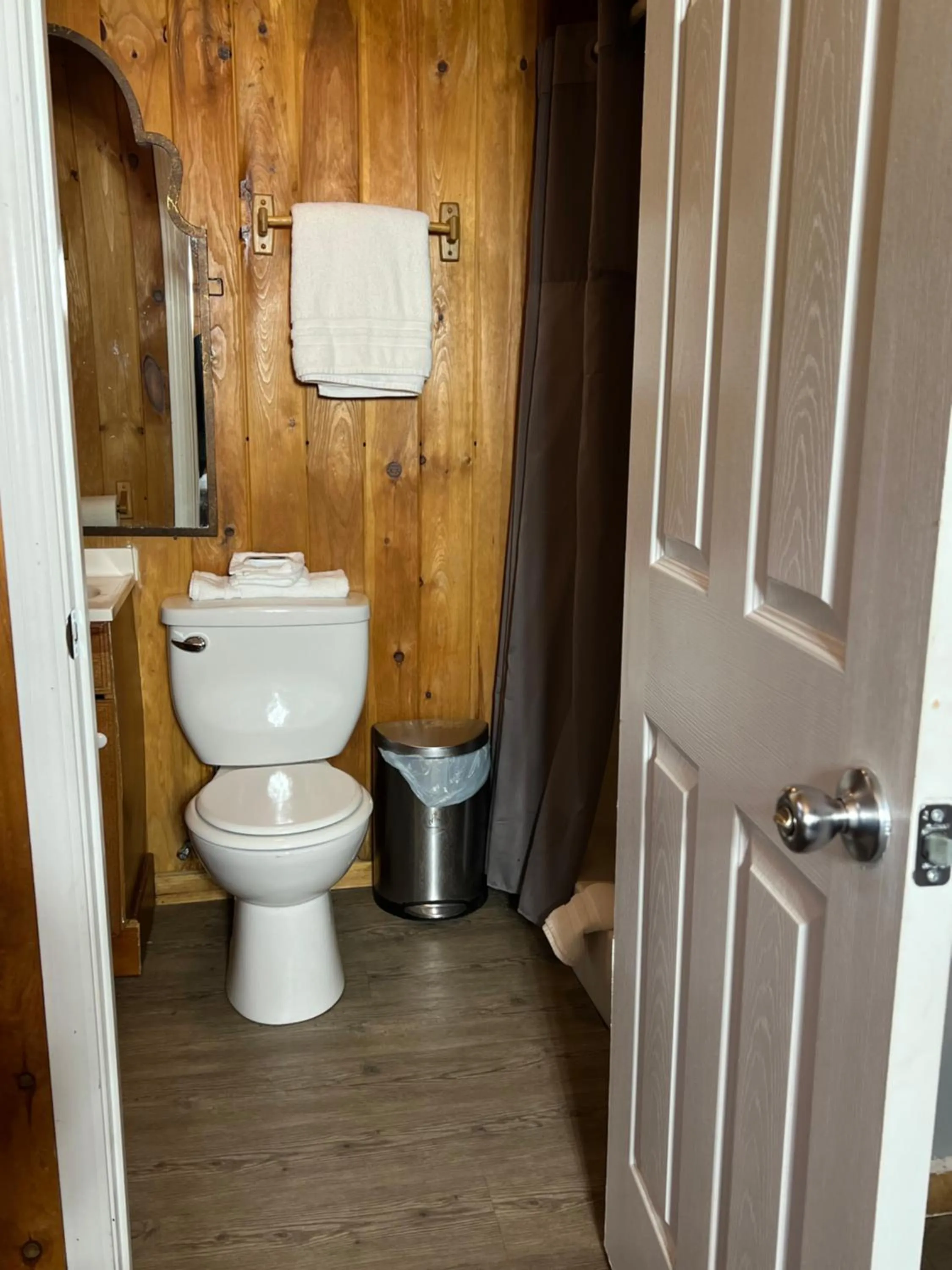 Toilet in Kozy Haven Log Cabin Rentals