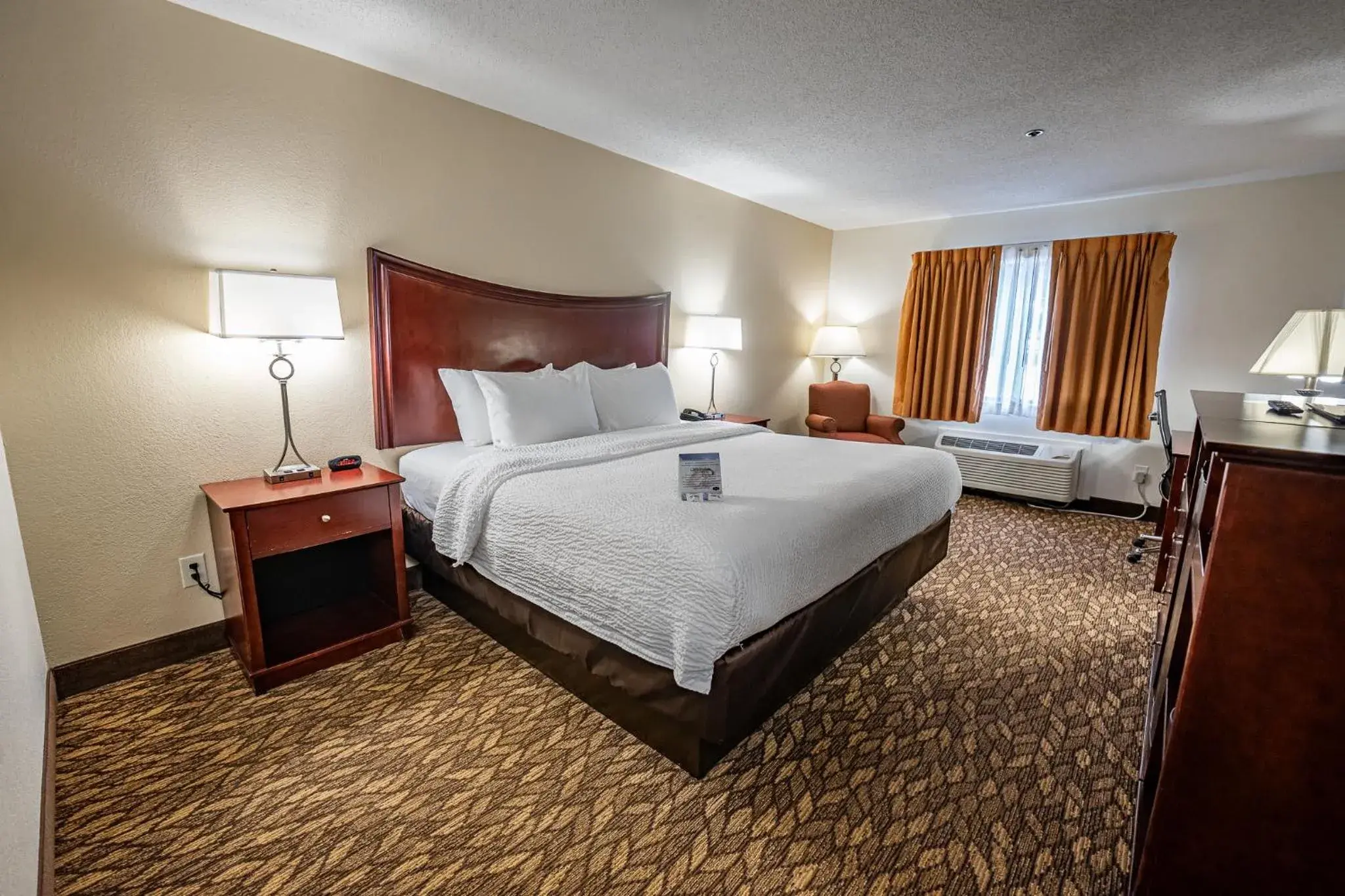 Bed in Christopher Inn and Suites Bed in Christopher Inn and Suites