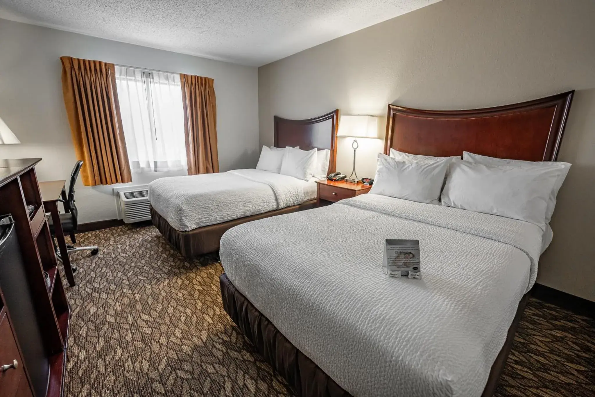 Bed in Christopher Inn and Suites Bed in Christopher Inn and Suites