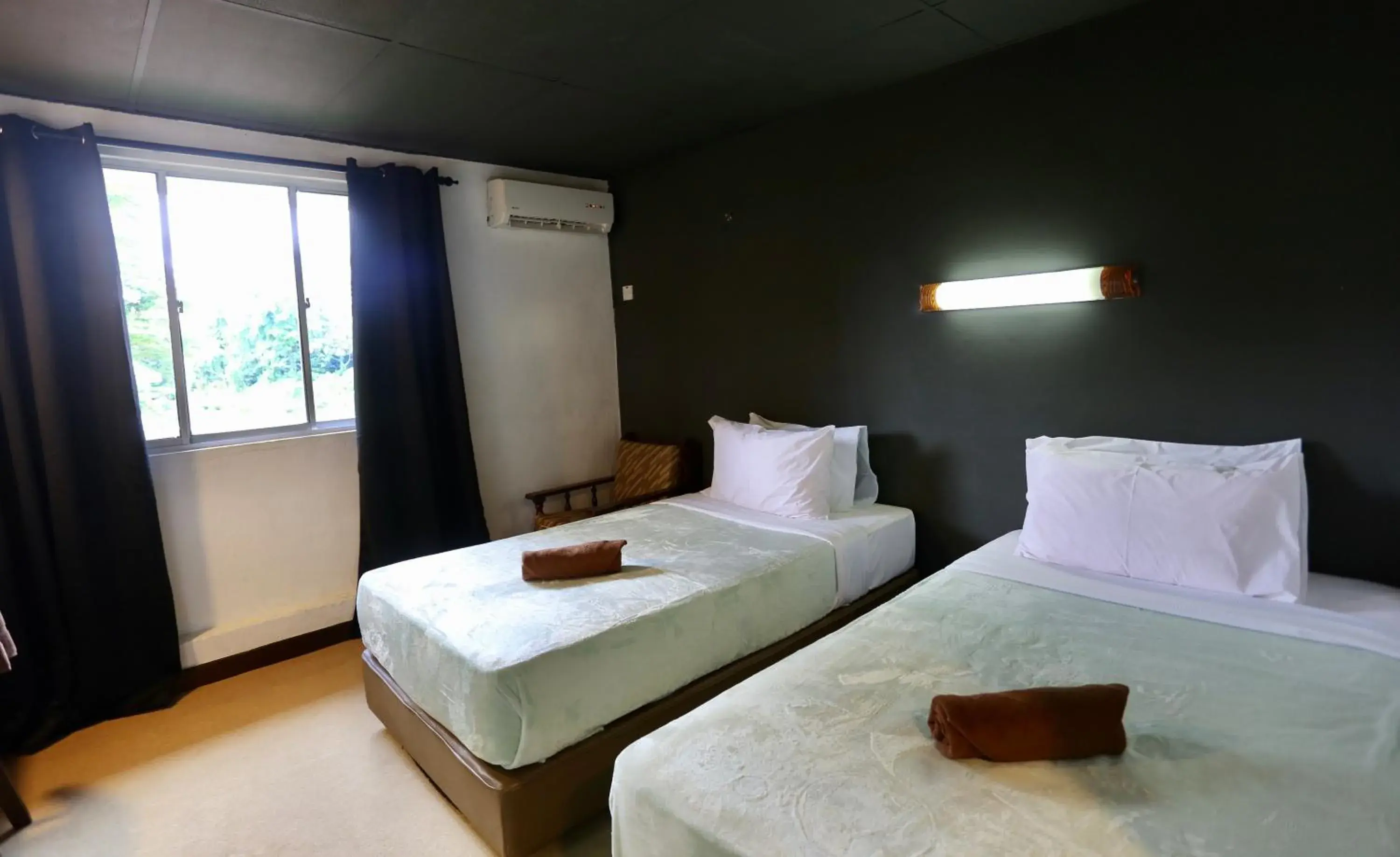 Bed in Fata Hotel by Project Borneo Bed in Fata Hotel by Project Borneo