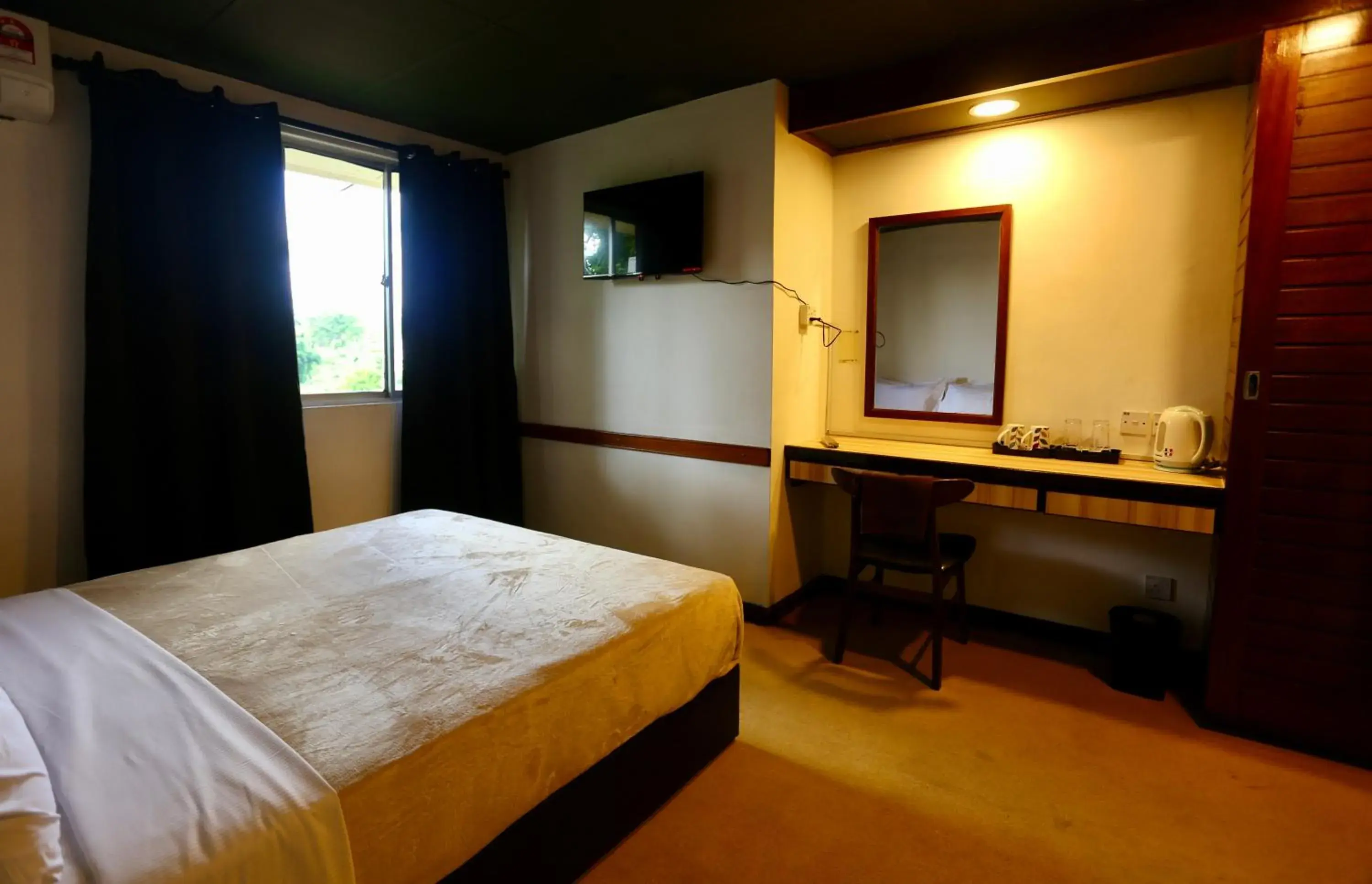 Bed in Fata Hotel by Project Borneo Bed in Fata Hotel by Project Borneo