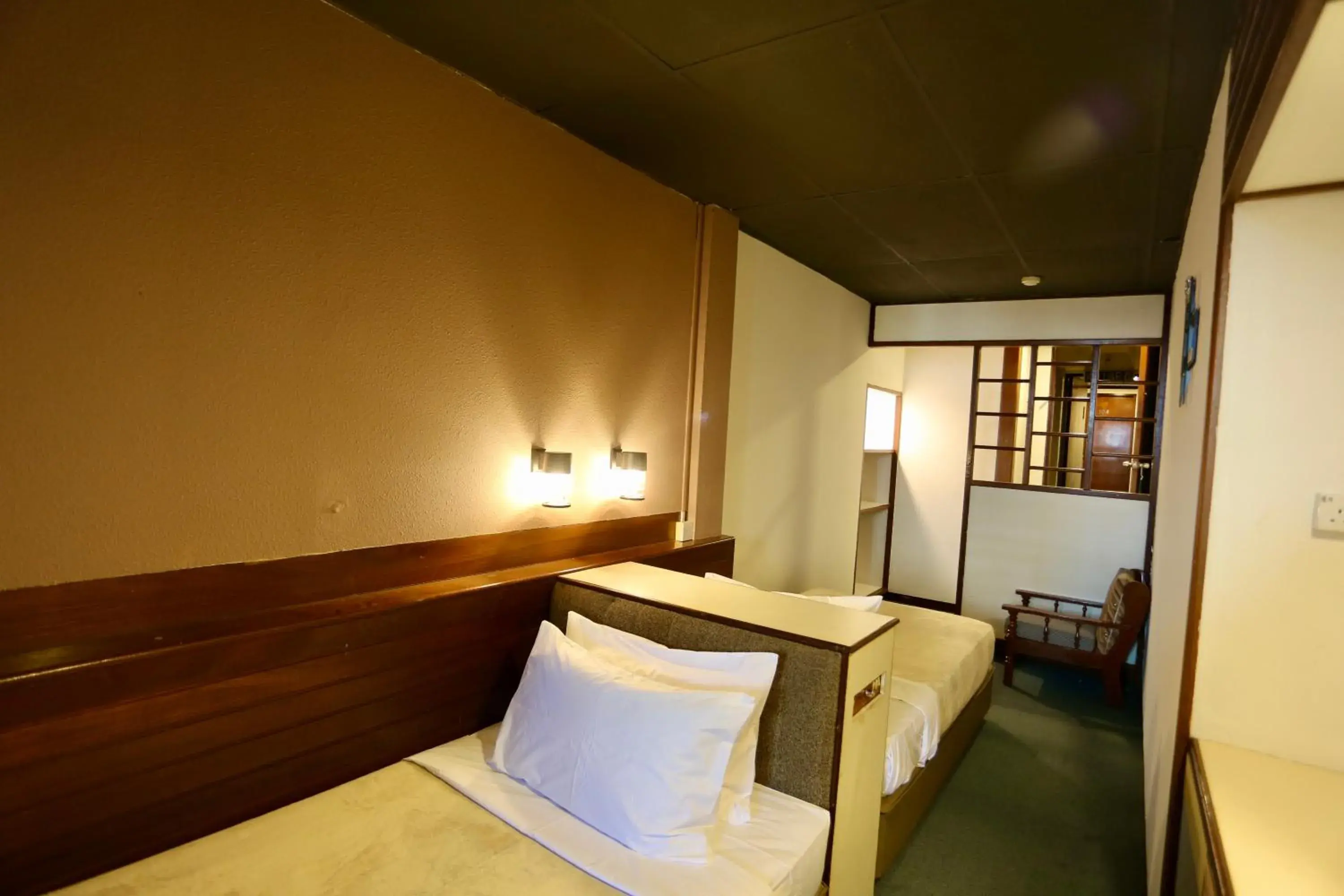 Bed in Fata Hotel by Project Borneo Bed in Fata Hotel by Project Borneo