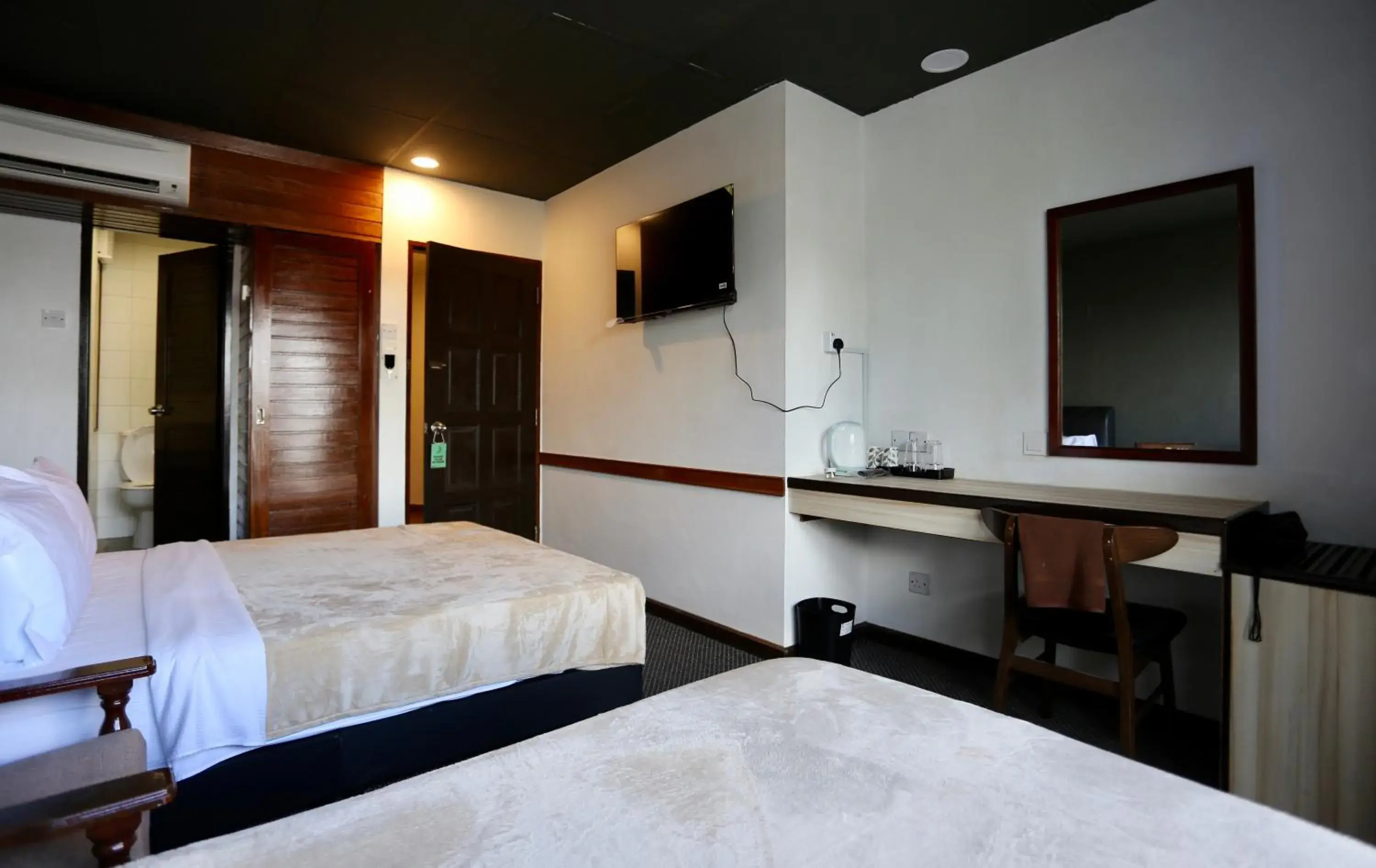 Bed in Fata Hotel by Project Borneo Bed in Fata Hotel by Project Borneo