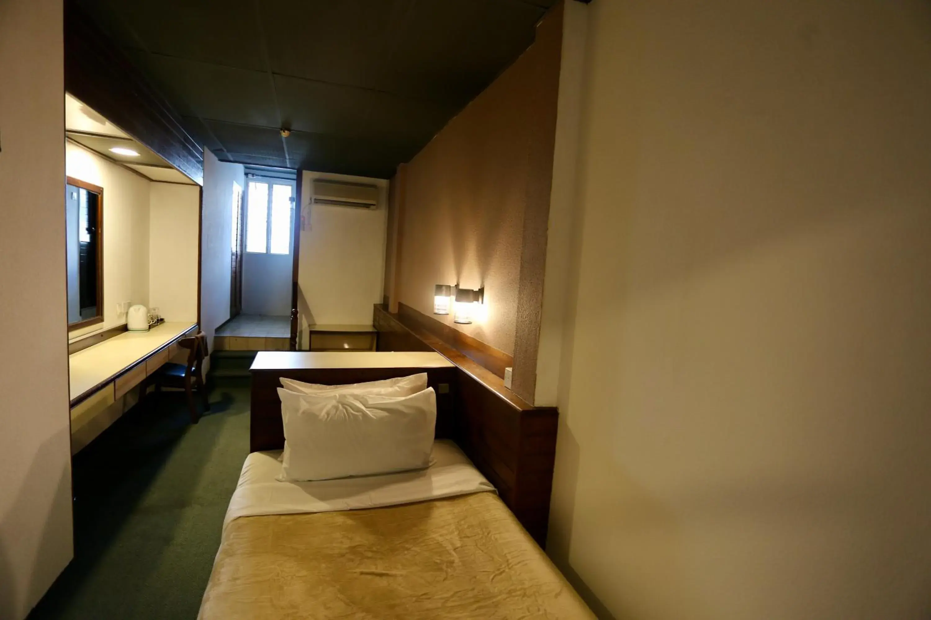 Bed in Fata Hotel by Project Borneo Bed in Fata Hotel by Project Borneo