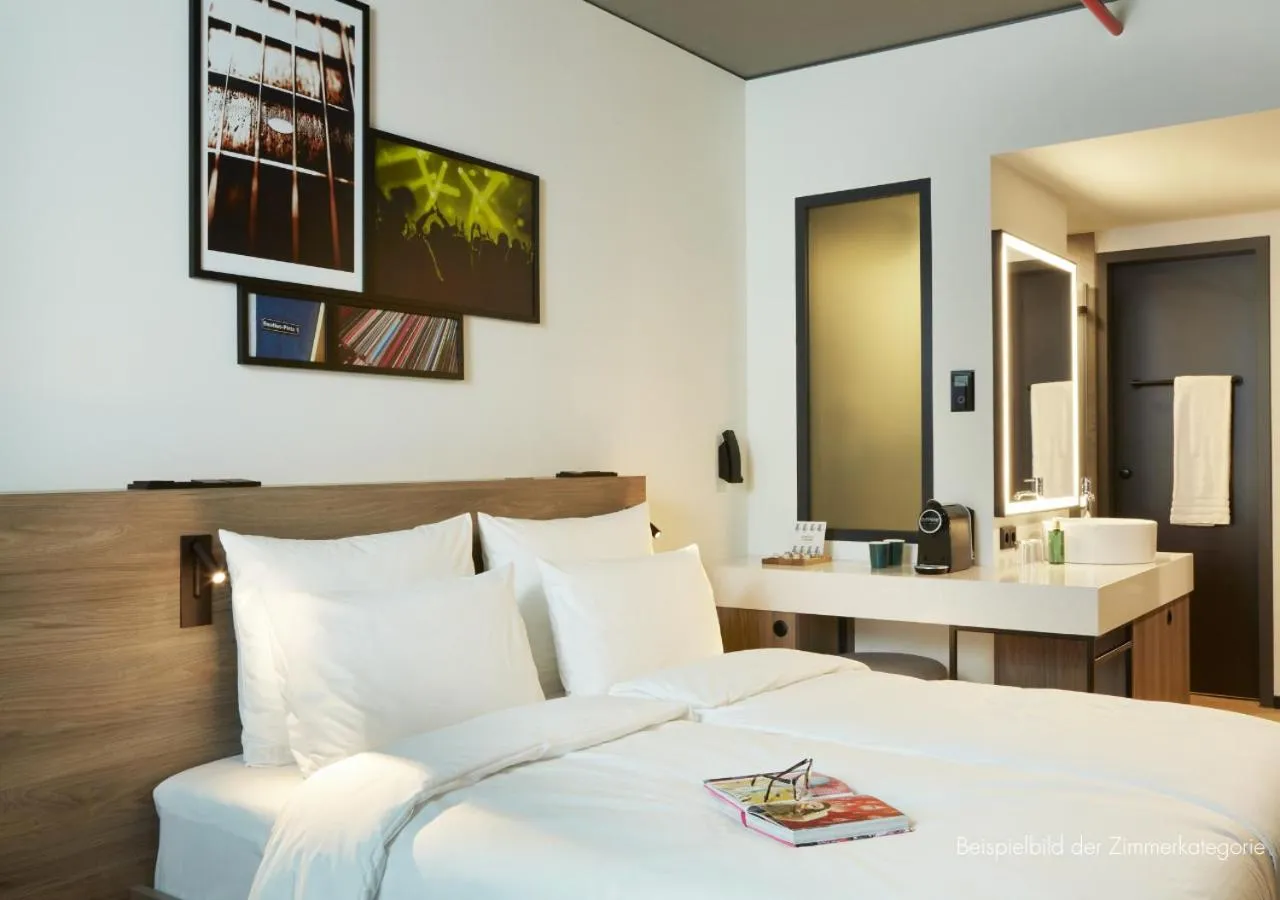 Photo of the whole room, Bed in REVERB by Hard Rock Hamburg