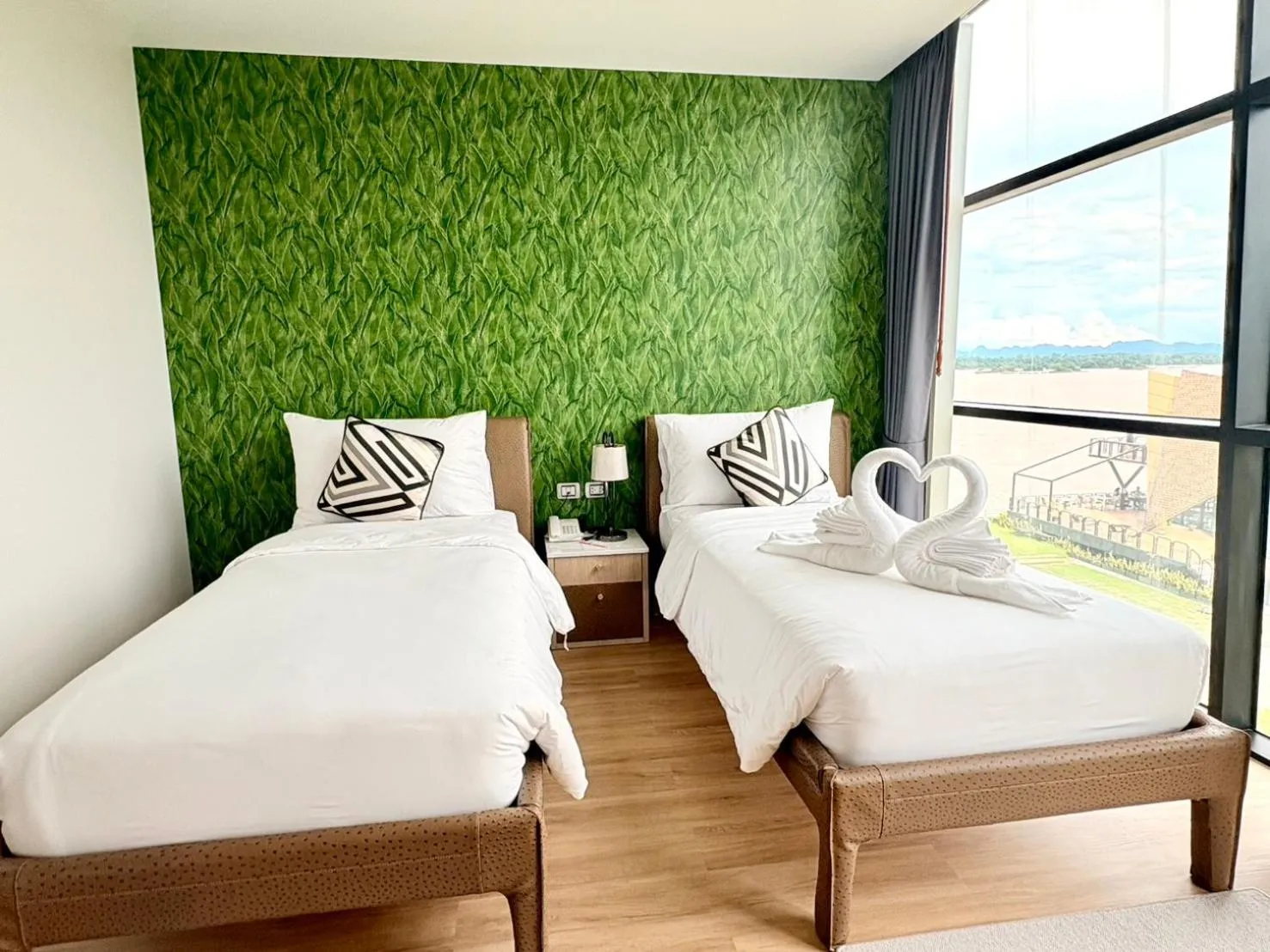 Bed in Naka-Raj Escape Hotel