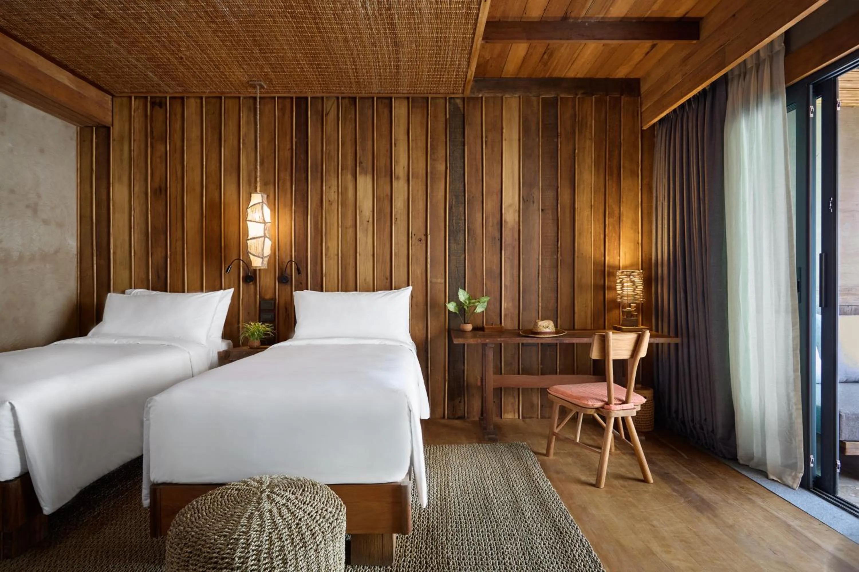 Bed in Vignette Collection Dinso Resort & Villas Ko Chang by IHG