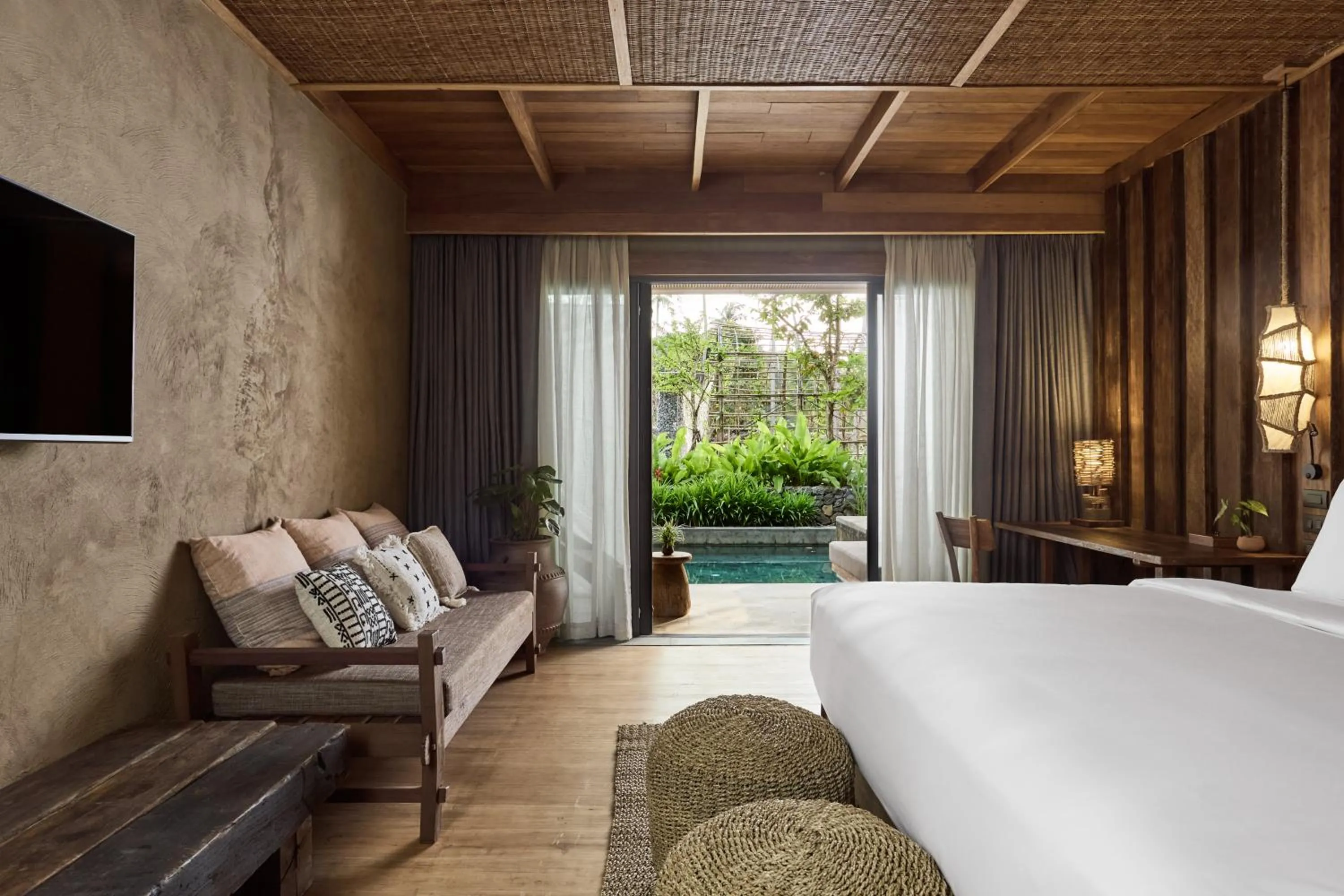 Bed in Vignette Collection Dinso Resort & Villas Ko Chang by IHG