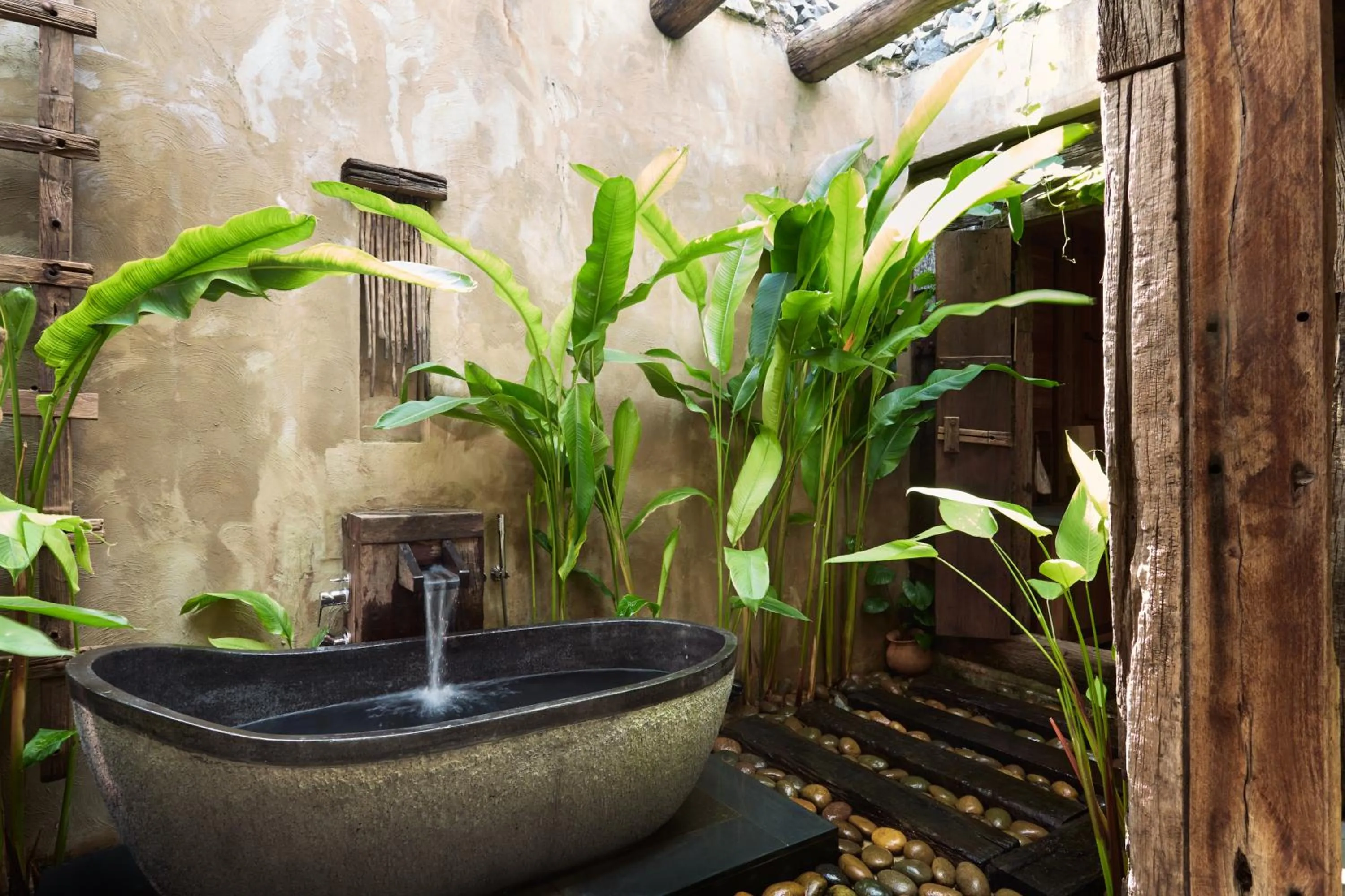 Bathroom in Vignette Collection Dinso Resort & Villas Ko Chang by IHG