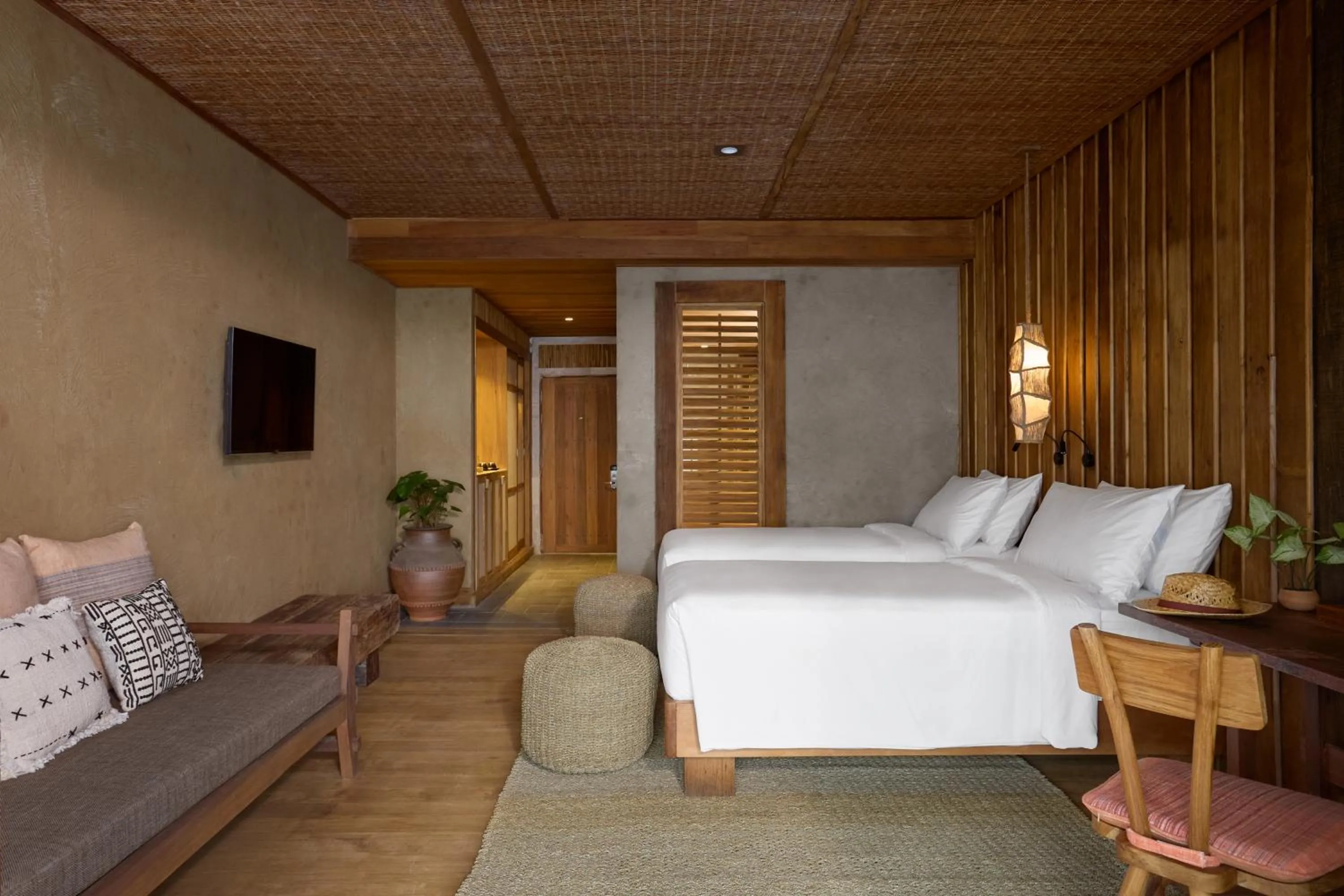 Bed in Vignette Collection Dinso Resort & Villas Ko Chang by IHG
