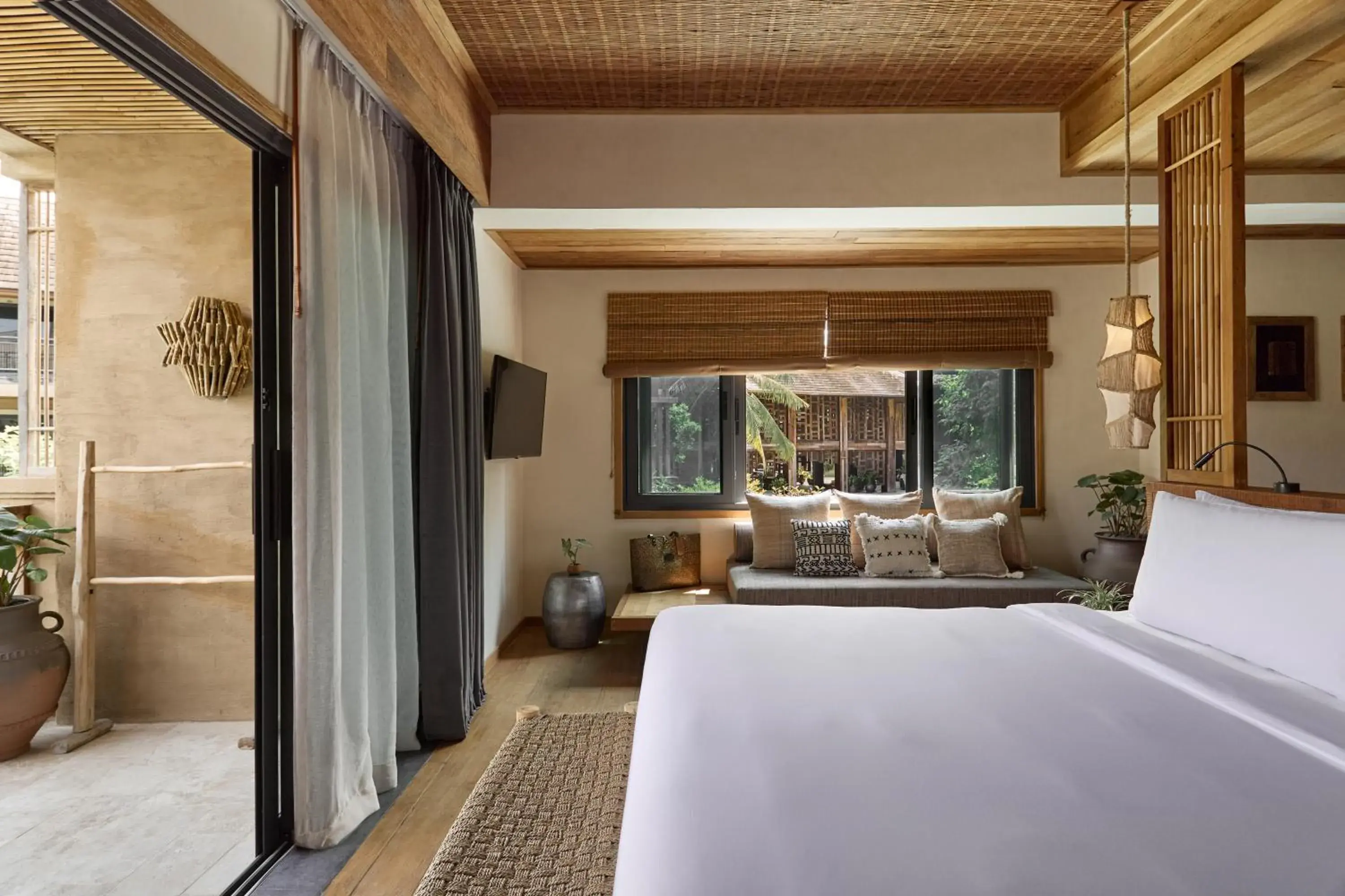 Bed in Vignette Collection Dinso Resort & Villas Ko Chang by IHG Bed in Vignette Collection Dinso Resort & Villas Ko Chang by IHG